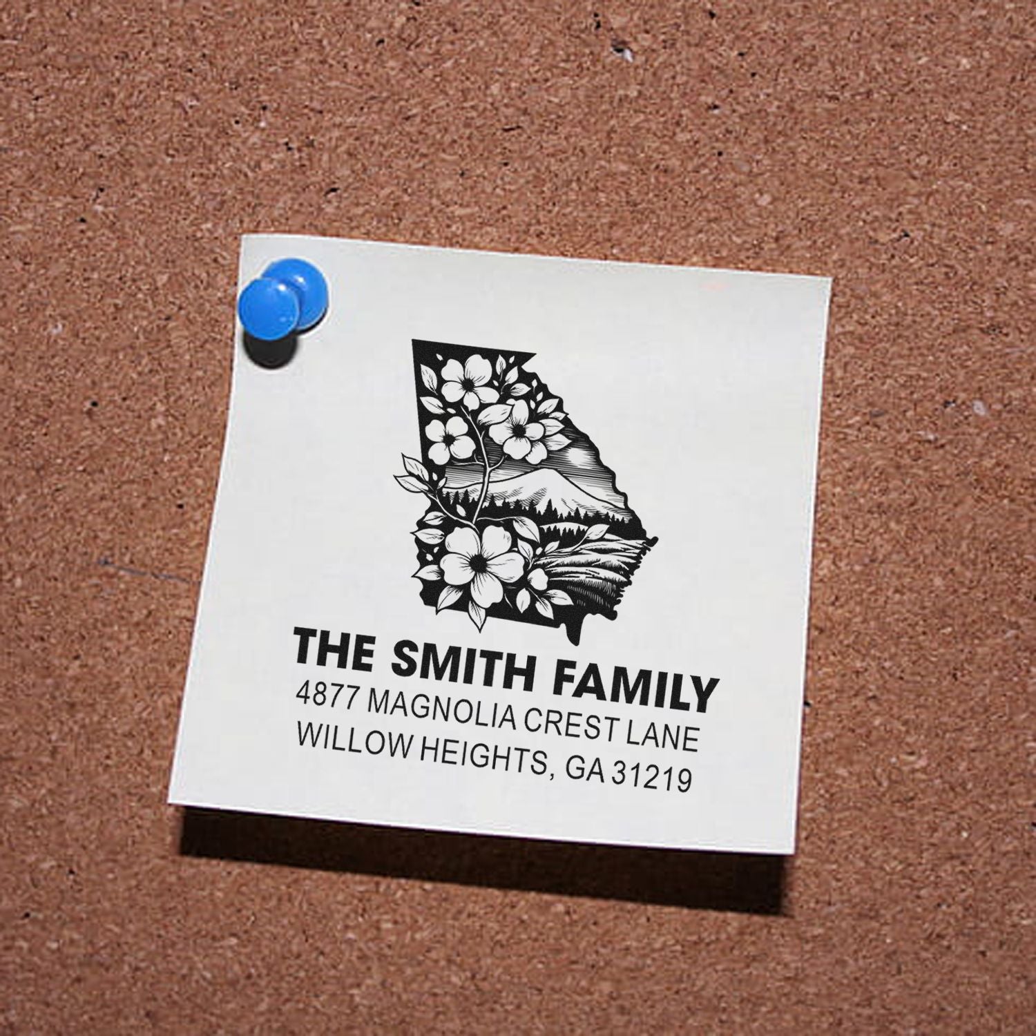 Custom return address rubber stamp for The Smith Family with Georgia floral state design and home address.
