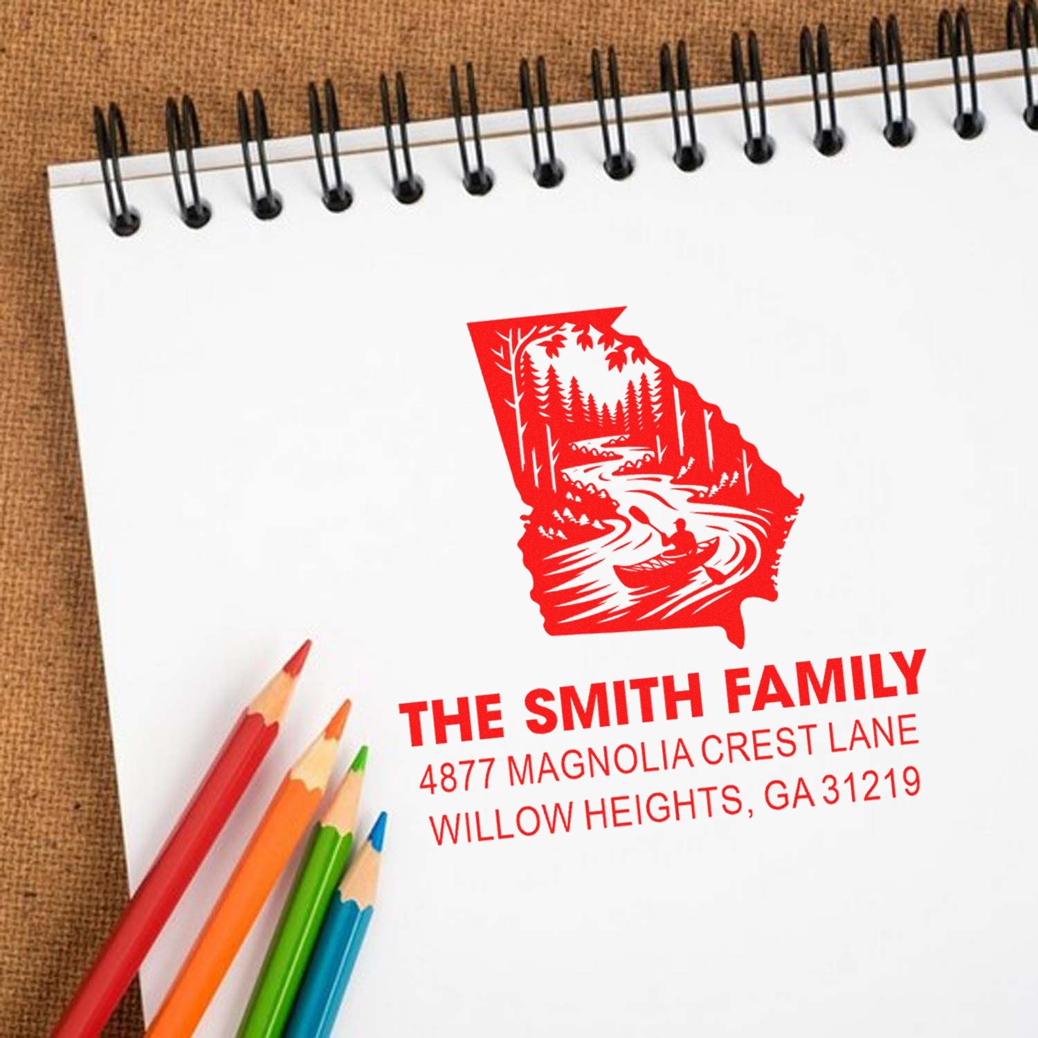 Personalized return address rubber stamp for The Smith Family with Georgia state river design.