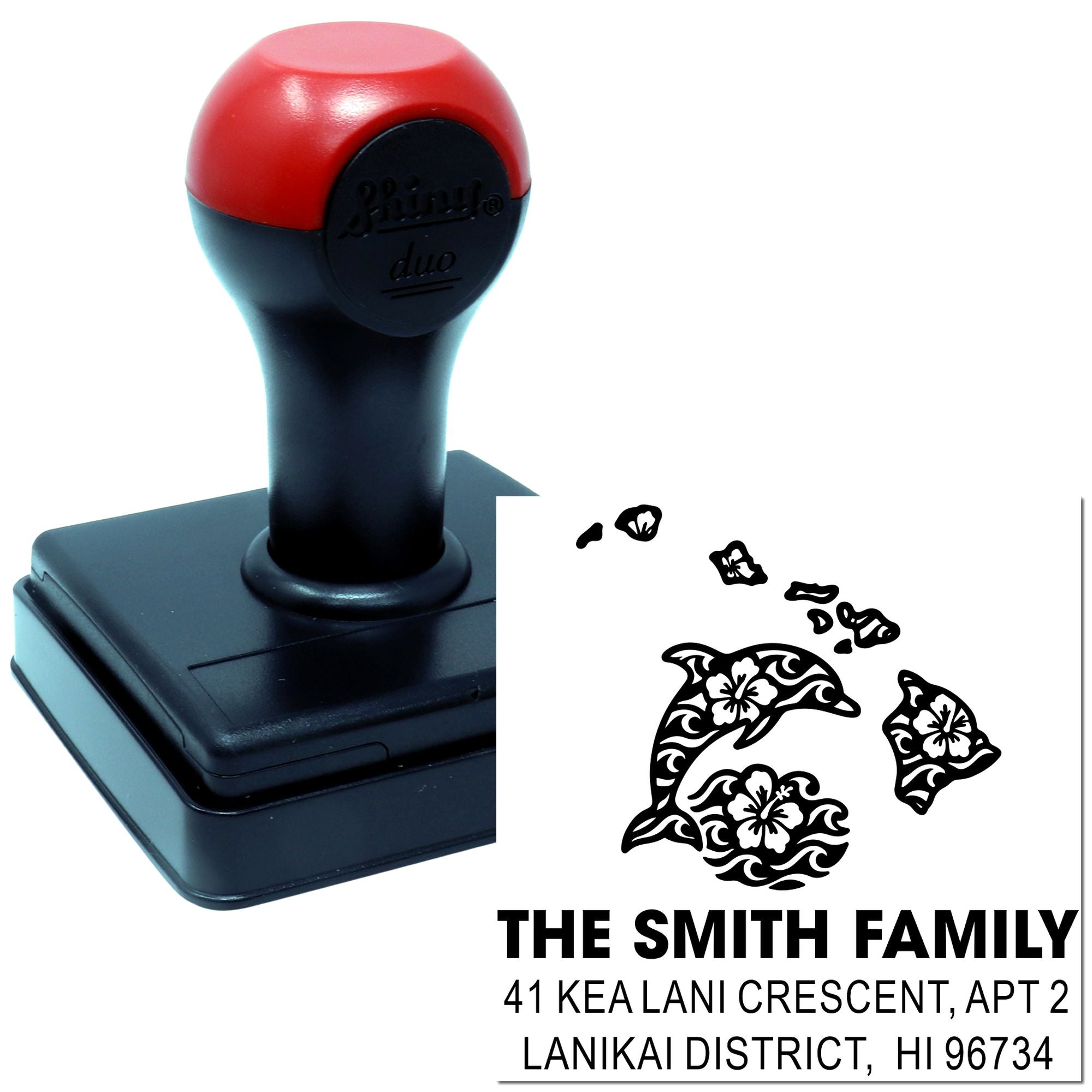 Custom self-inking rubber stamp with dolphin family design for personalized return address stamping on mail and invitations.
