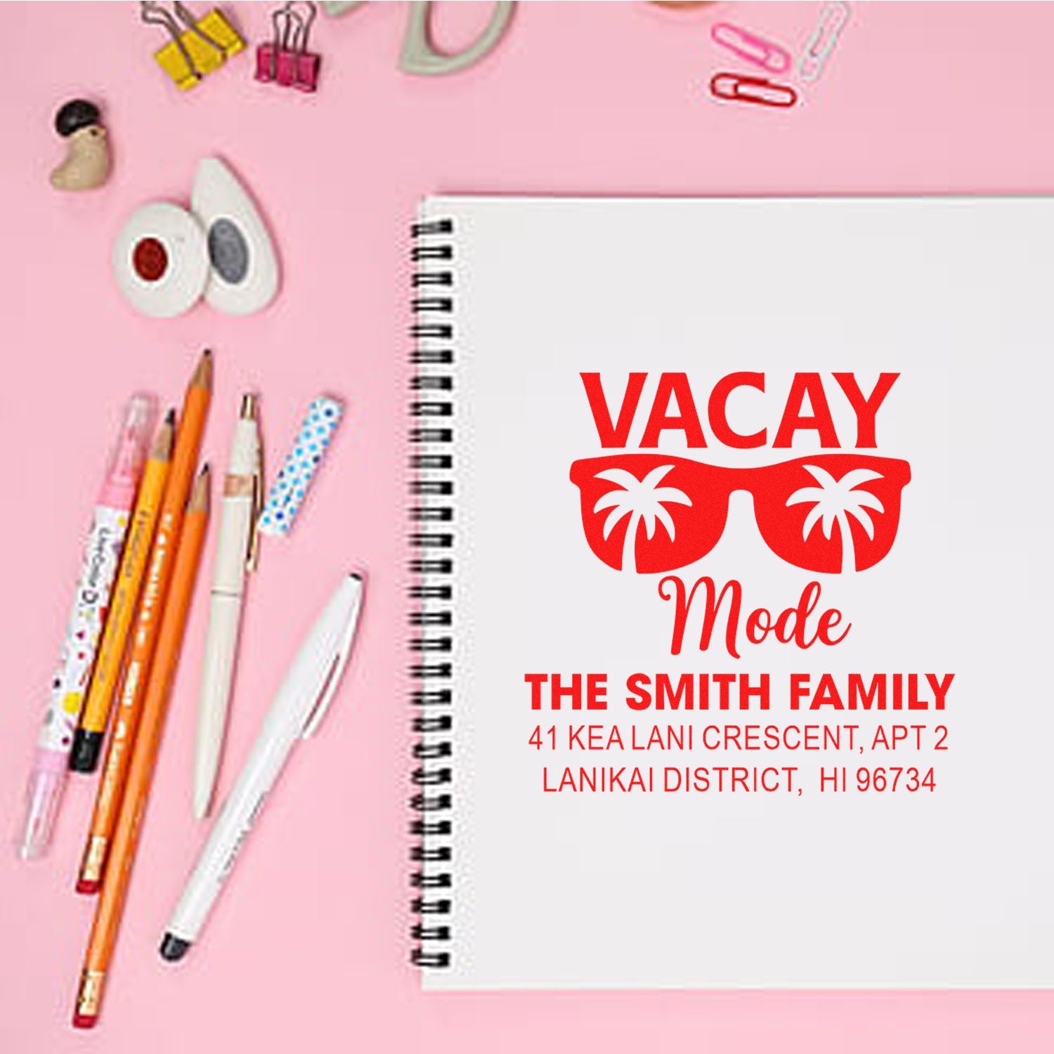 Custom rubber stamp for vacation stationery with family name and address, featuring a palm tree sunglasses design.