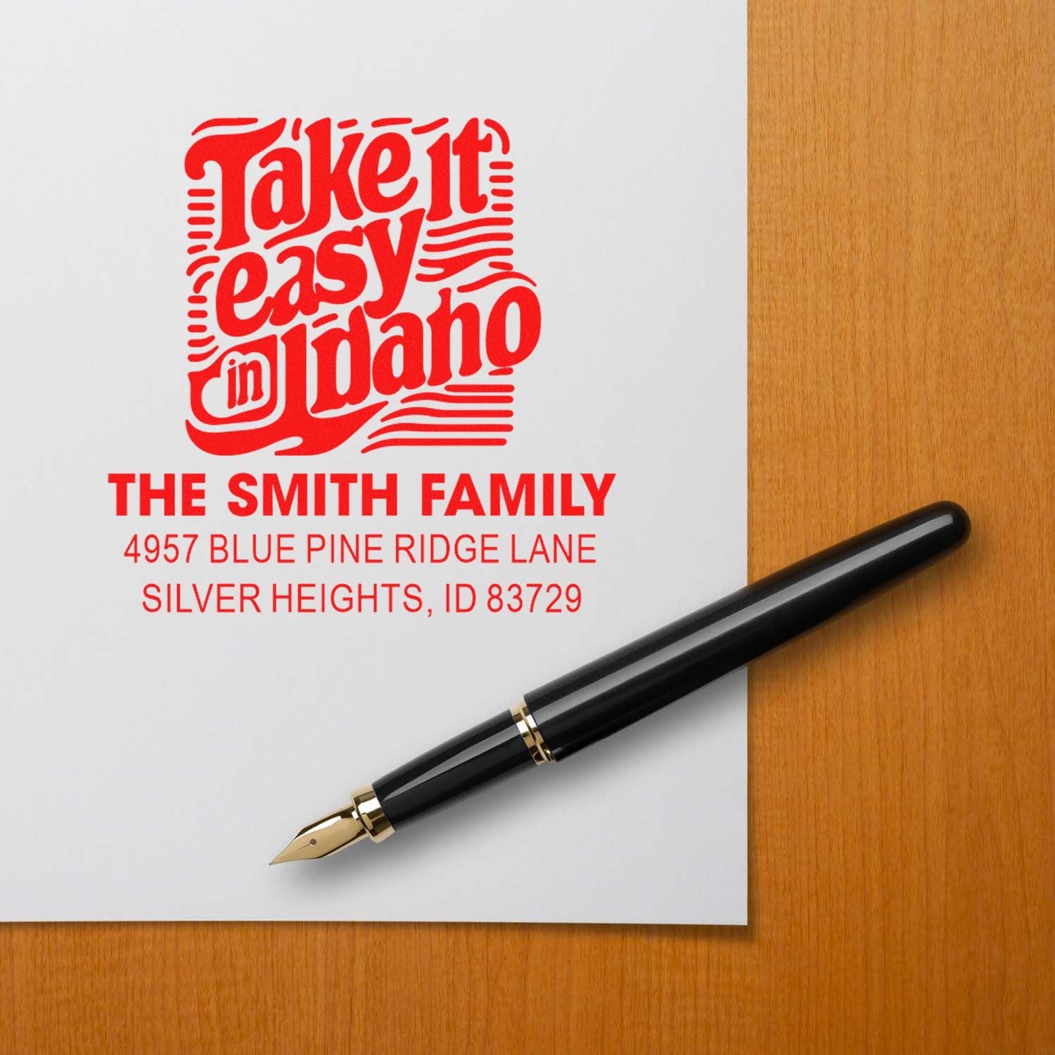 Custom rubber return address stamp for The Smith Family with Take it easy in Idaho design and address imprint
