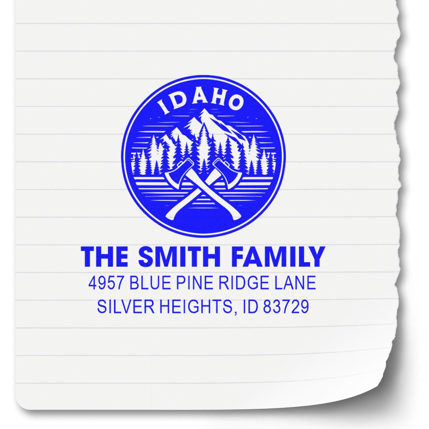 Custom Idaho return address rubber stamp for The Smith Family with mountain, pine tree, and axe logo.