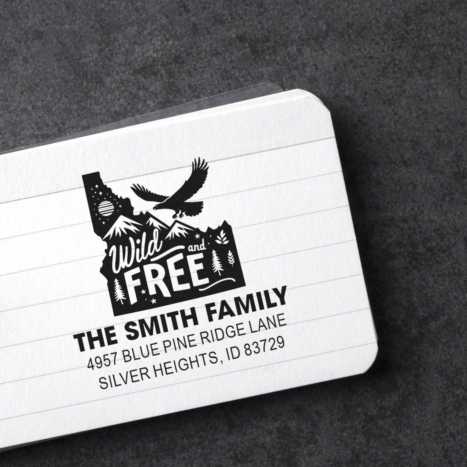 Custom rubber stamp with Wild and Free mountain design, personalized return address for The Smith Family.