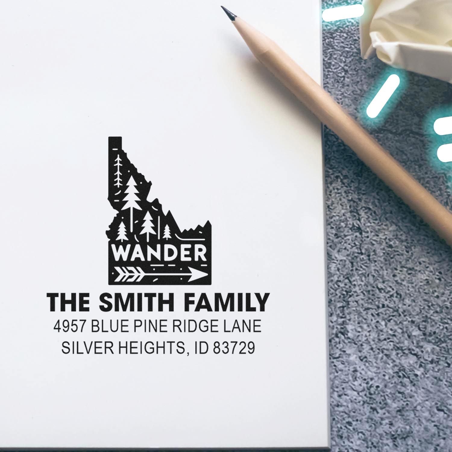 Custom rubber address stamp with Idaho map, Wander design, and Smith family return address for Blue Pine Ridge Lane.