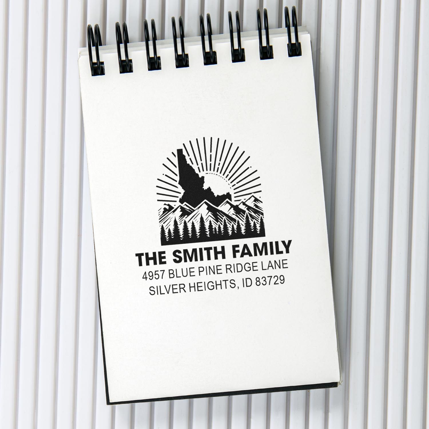 Custom family address rubber stamp with mountain design for personalized return address and mailing labels.