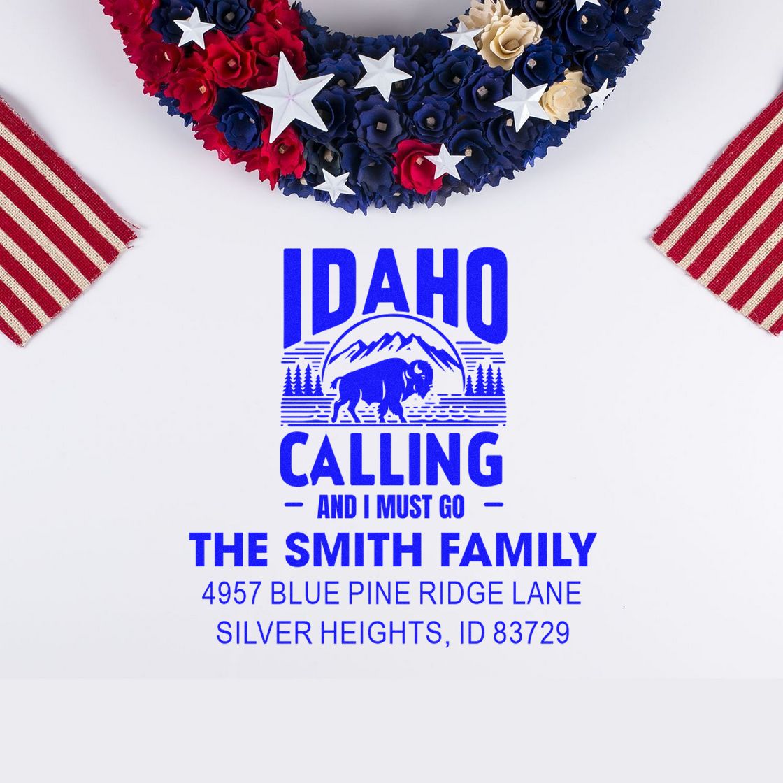 Custom Idaho Calling and I Must Go return address rubber stamp with family name, bison graphic, and patriotic decor.