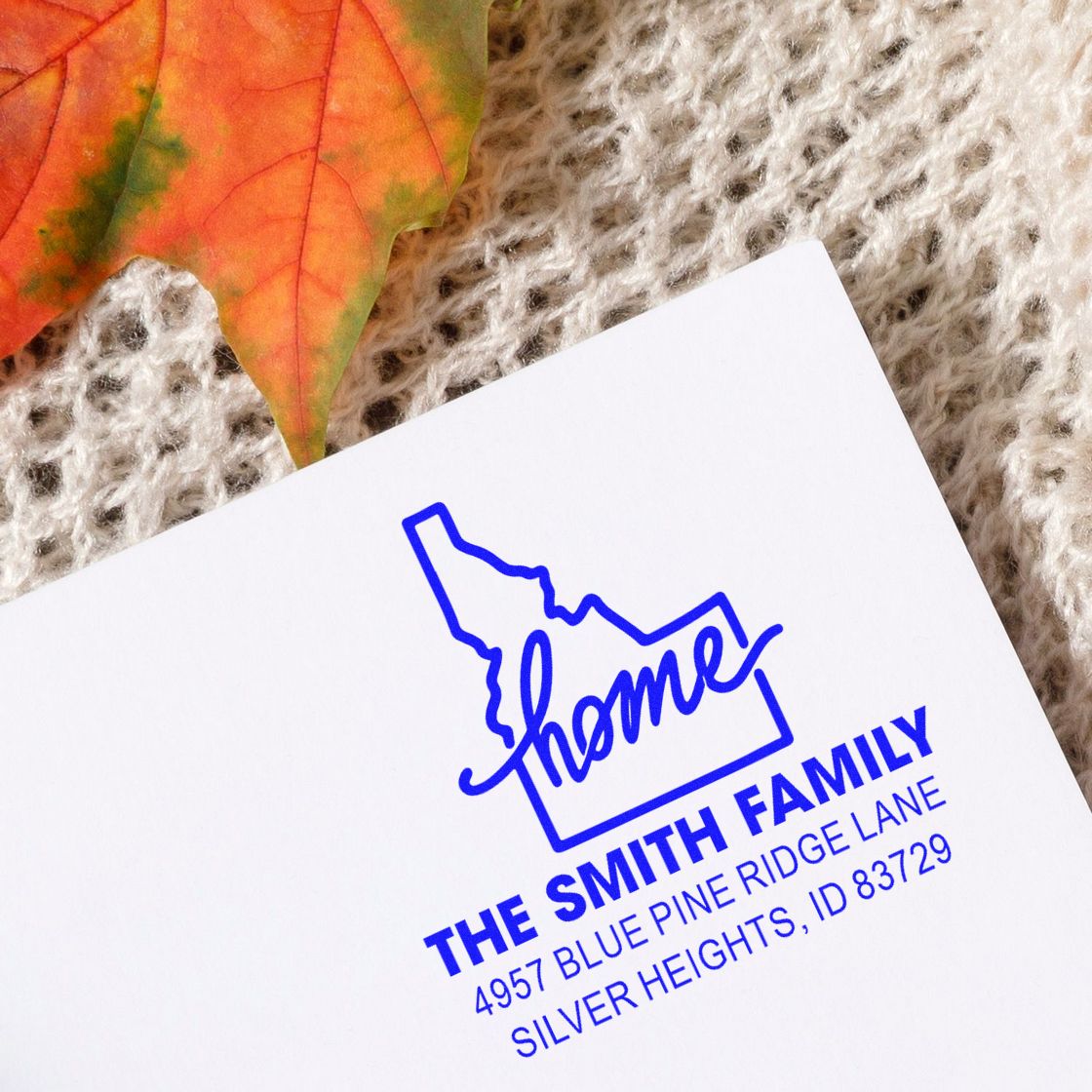 Custom return address rubber stamp with home icon and The Smith Family mailing address for personalized envelopes.