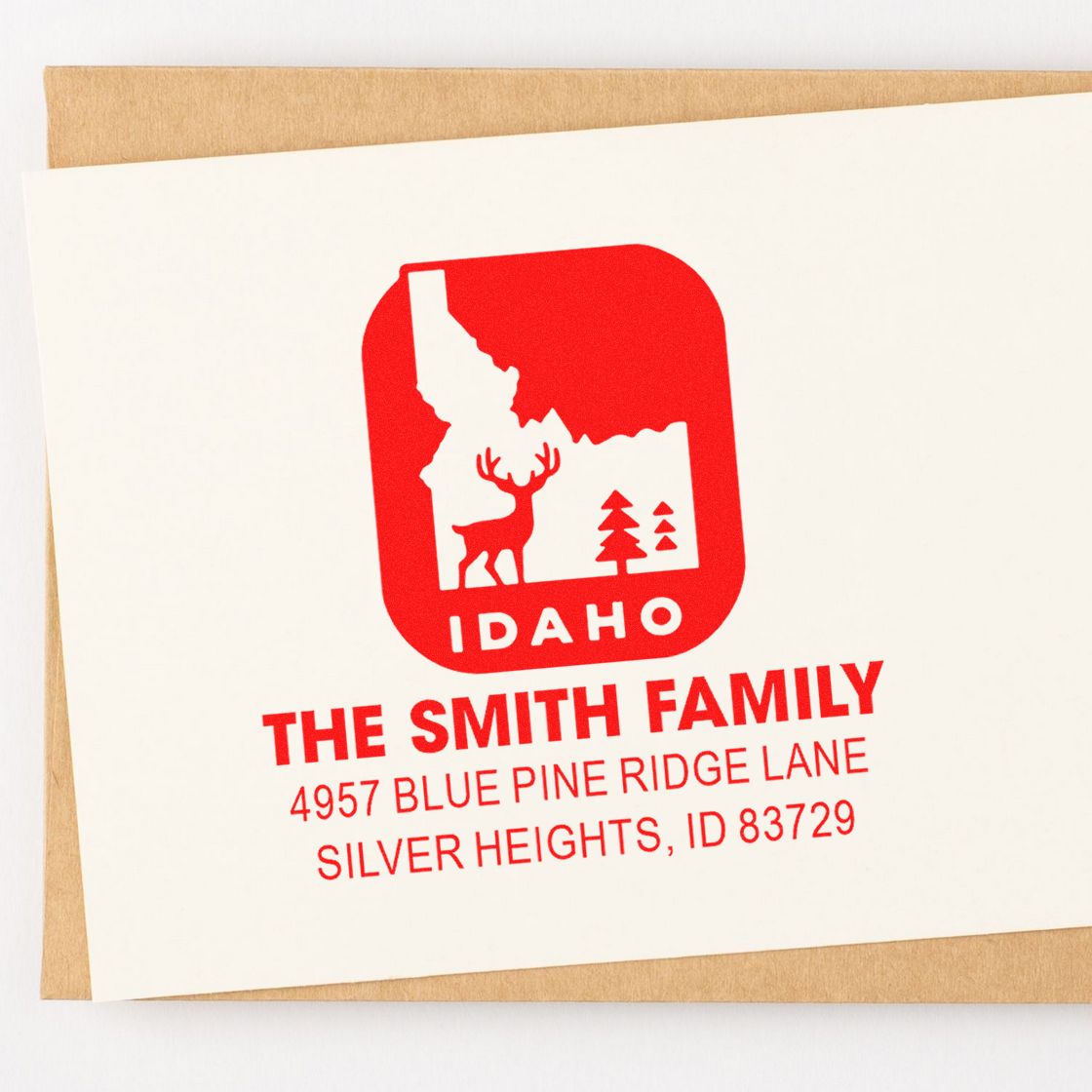 Custom Idaho return address stamp for The Smith Family with deer and pine design for Silver Heights mailings.