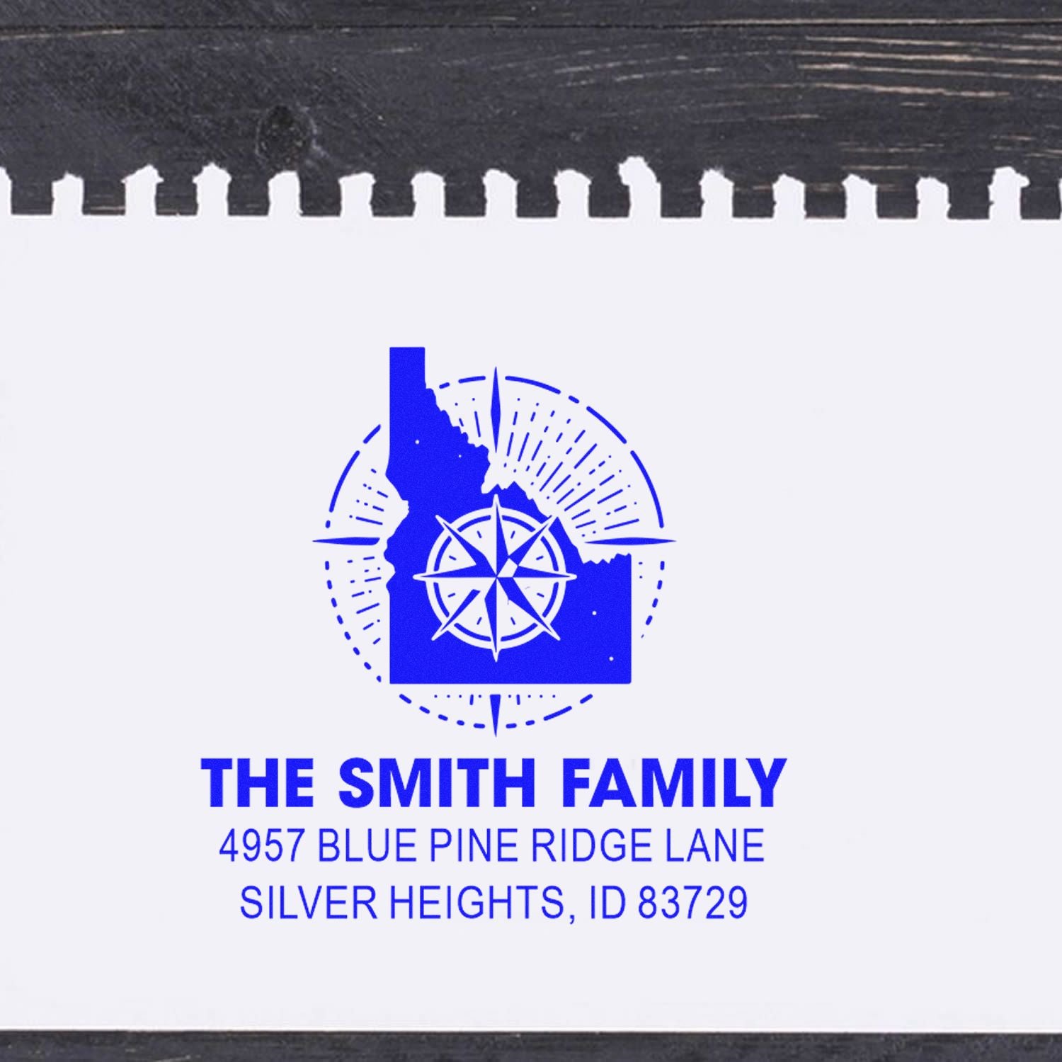 Custom return address rubber stamp for The Smith Family, Idaho compass logo, Silver Heights, ID address.
