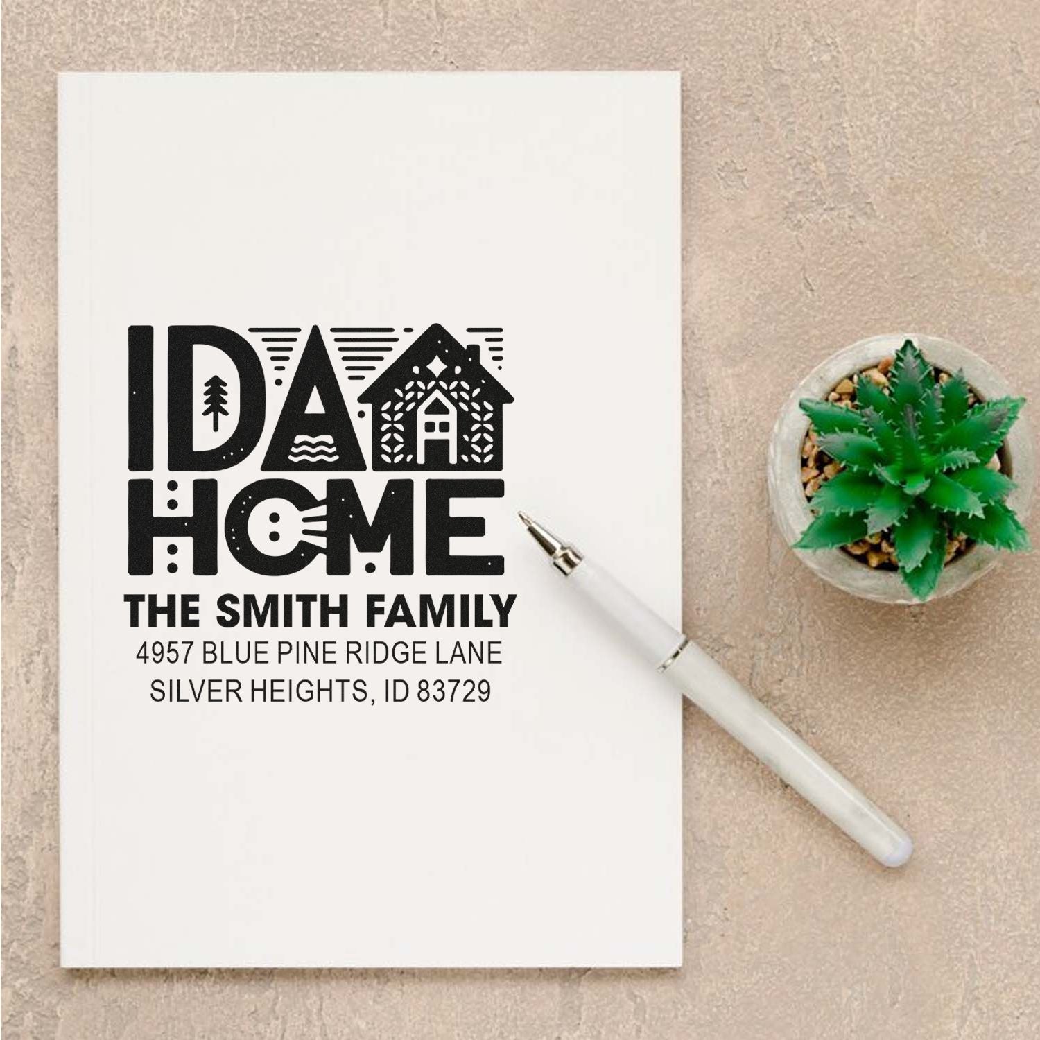 Personalized rubber return address stamp for The Smith Family, featuring an Ida Home design and full mailing address.