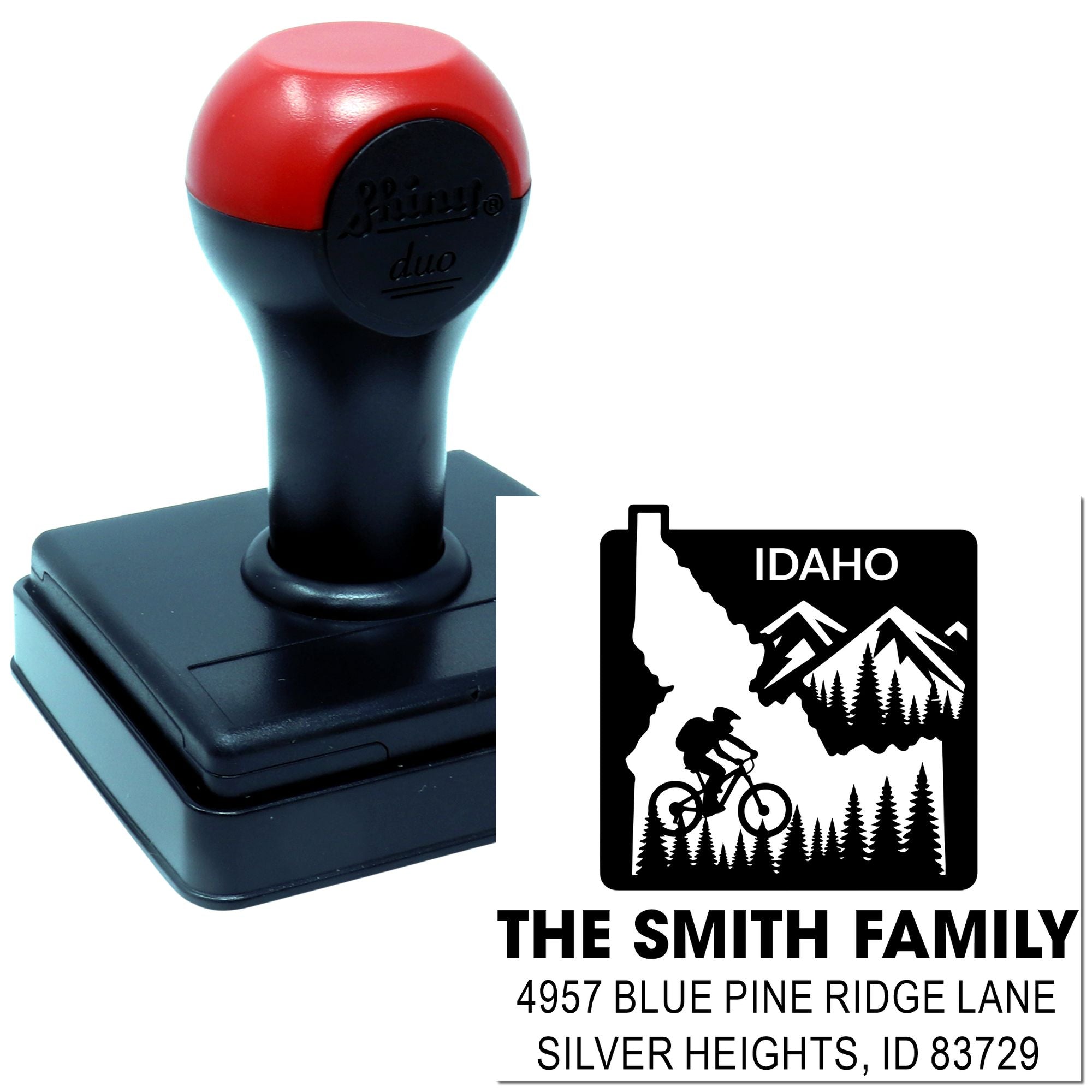 Custom self-inking rubber stamp for Idaho return address, featuring mountain biker family design for The Smith Family.