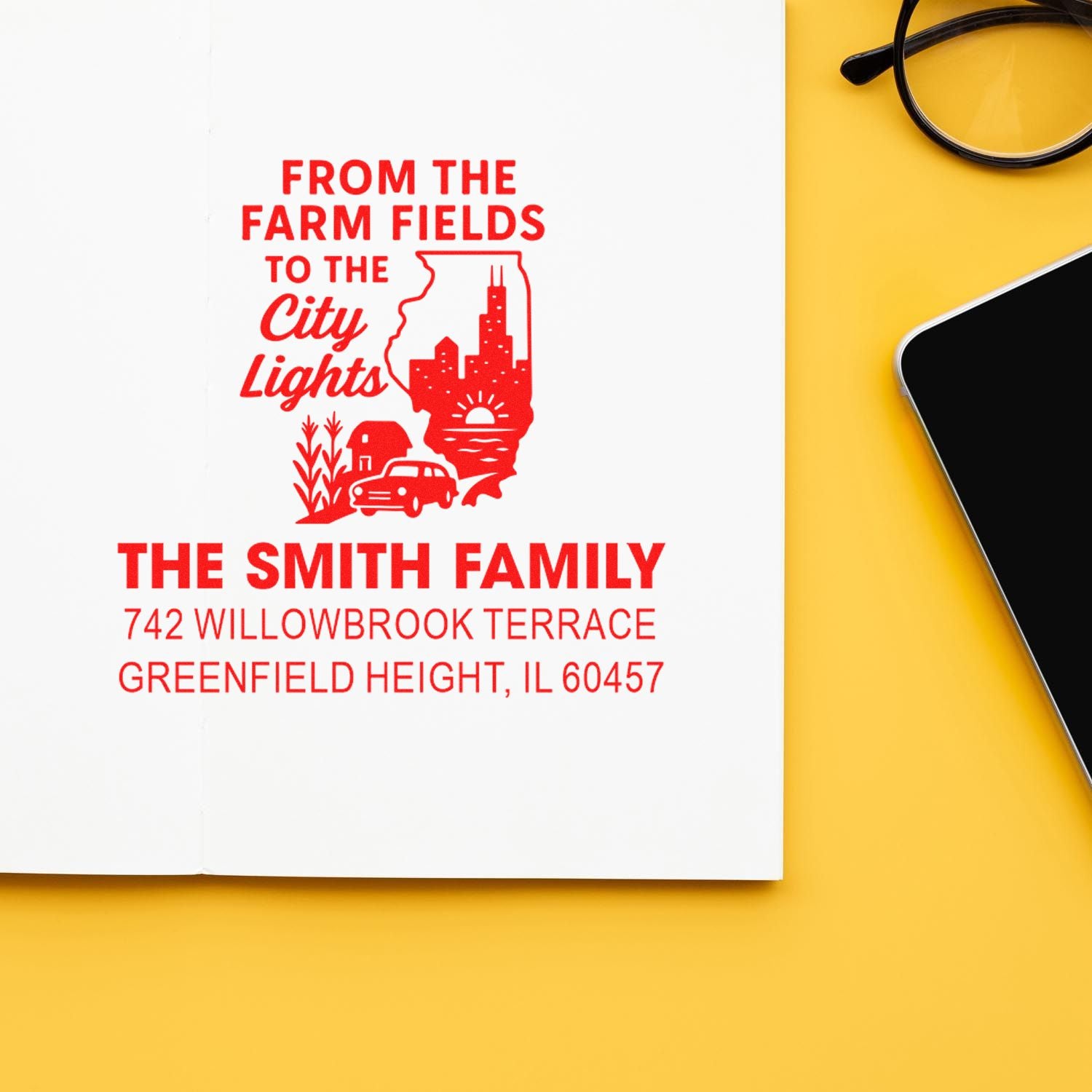 Custom rubber address stamp with farm-to-city design for The Smith Family, featuring Greenfield Heights, IL address.