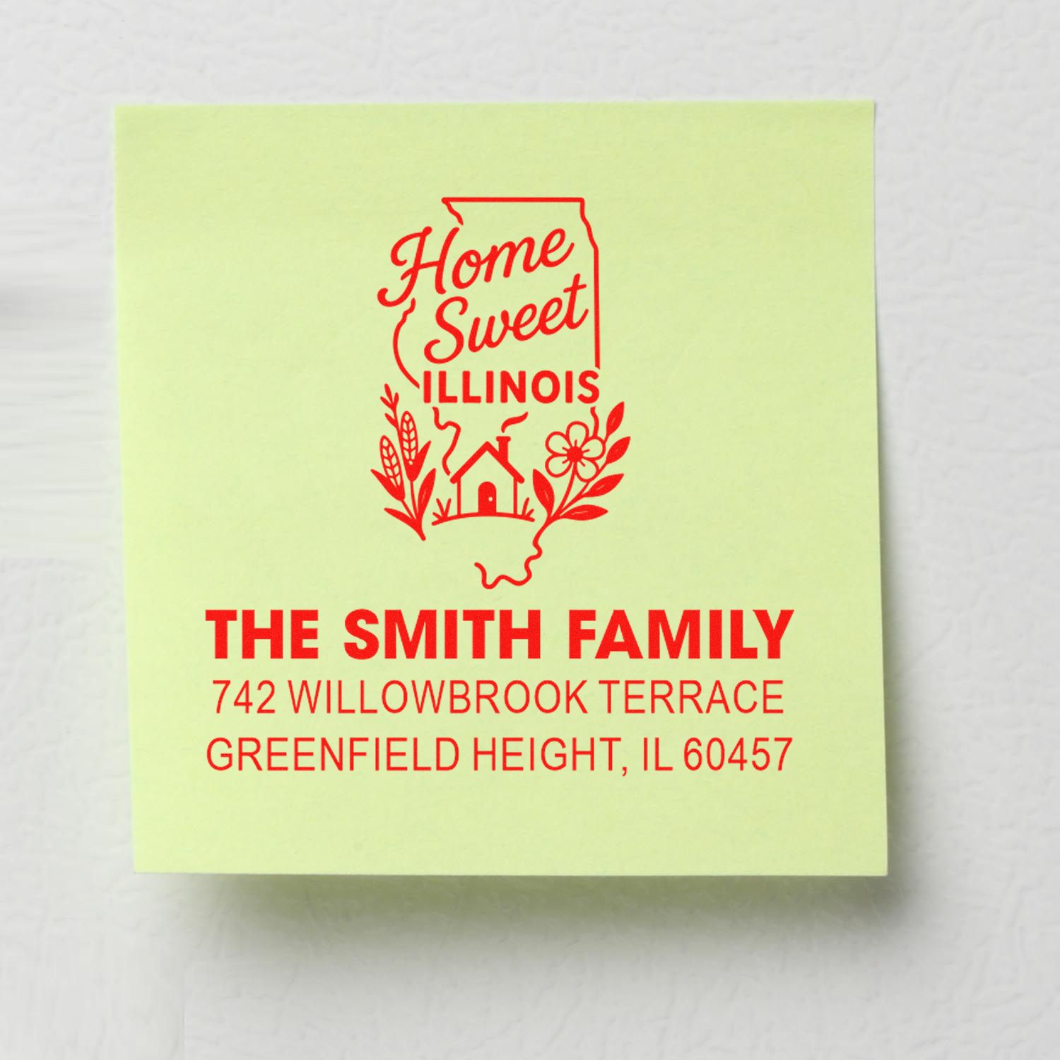 Custom address rubber stamp reading Home Sweet Illinois for The Smith Family, with Illinois outline and return address.