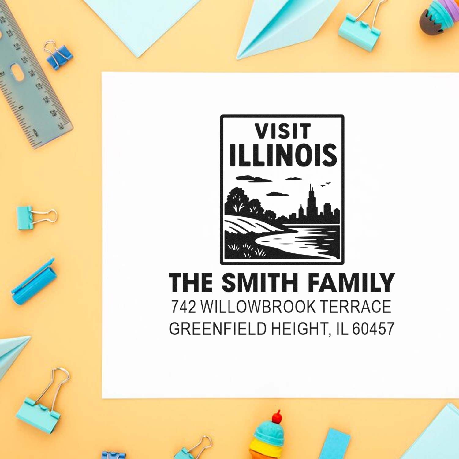 Custom address rubber stamp design reading Visit Illinois for The Smith Family, with Illinois skyline and mailing address.