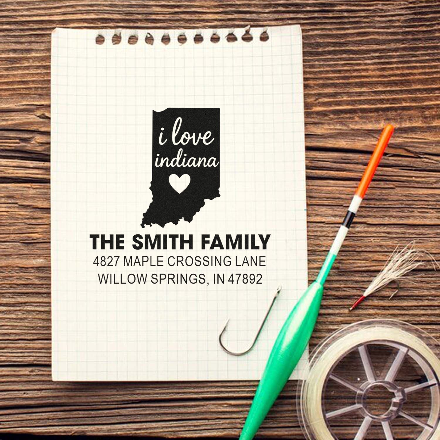 Personalized Indiana return address rubber stamp with family name and address for custom mailing and stationery.