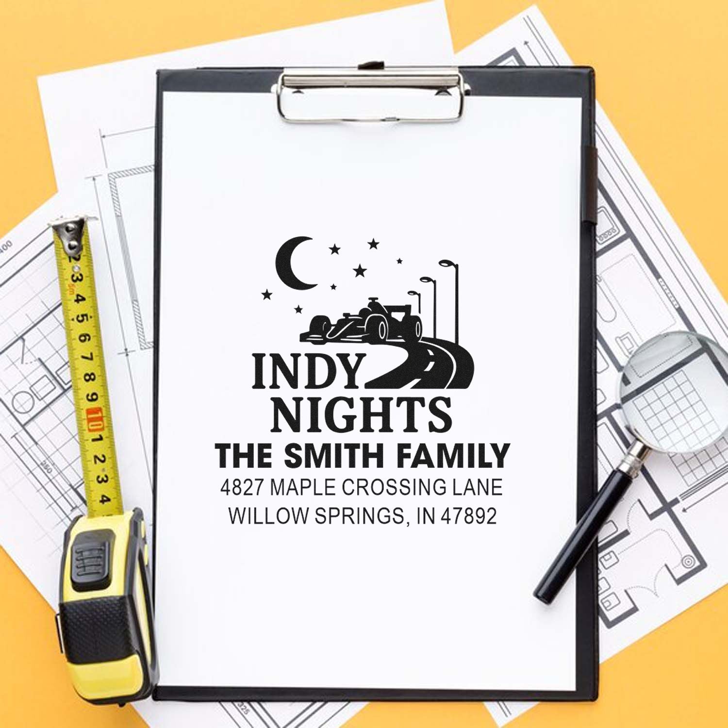 Personalized rubber stamp design for The Smith Family return address, featuring Indy Nights race car logo and address.