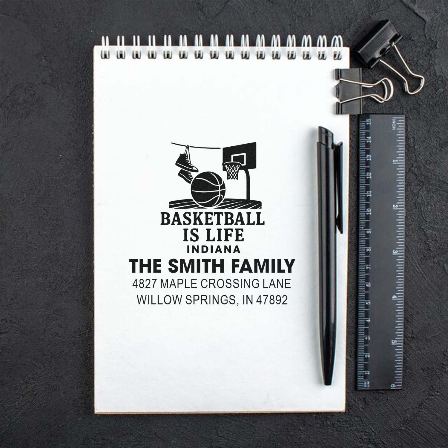 Custom basketball address rubber stamp with family name and Indiana address for personalized sports-themed stationery.