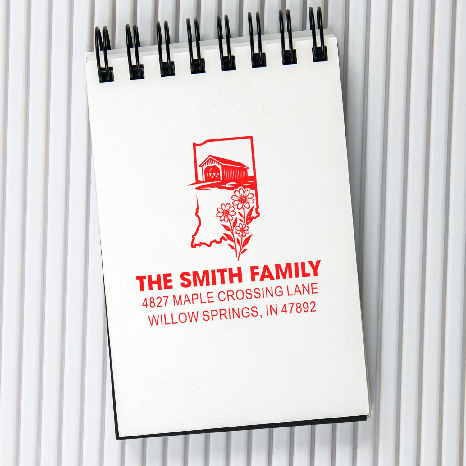 Custom return address rubber stamp for The Smith Family, featuring Indiana barn and floral design for mailing labels.