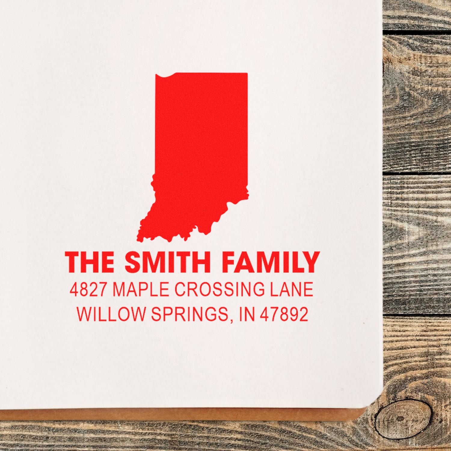 Custom Indiana family return address rubber stamp with The Smith Family name and Willow Springs, IN address in red.