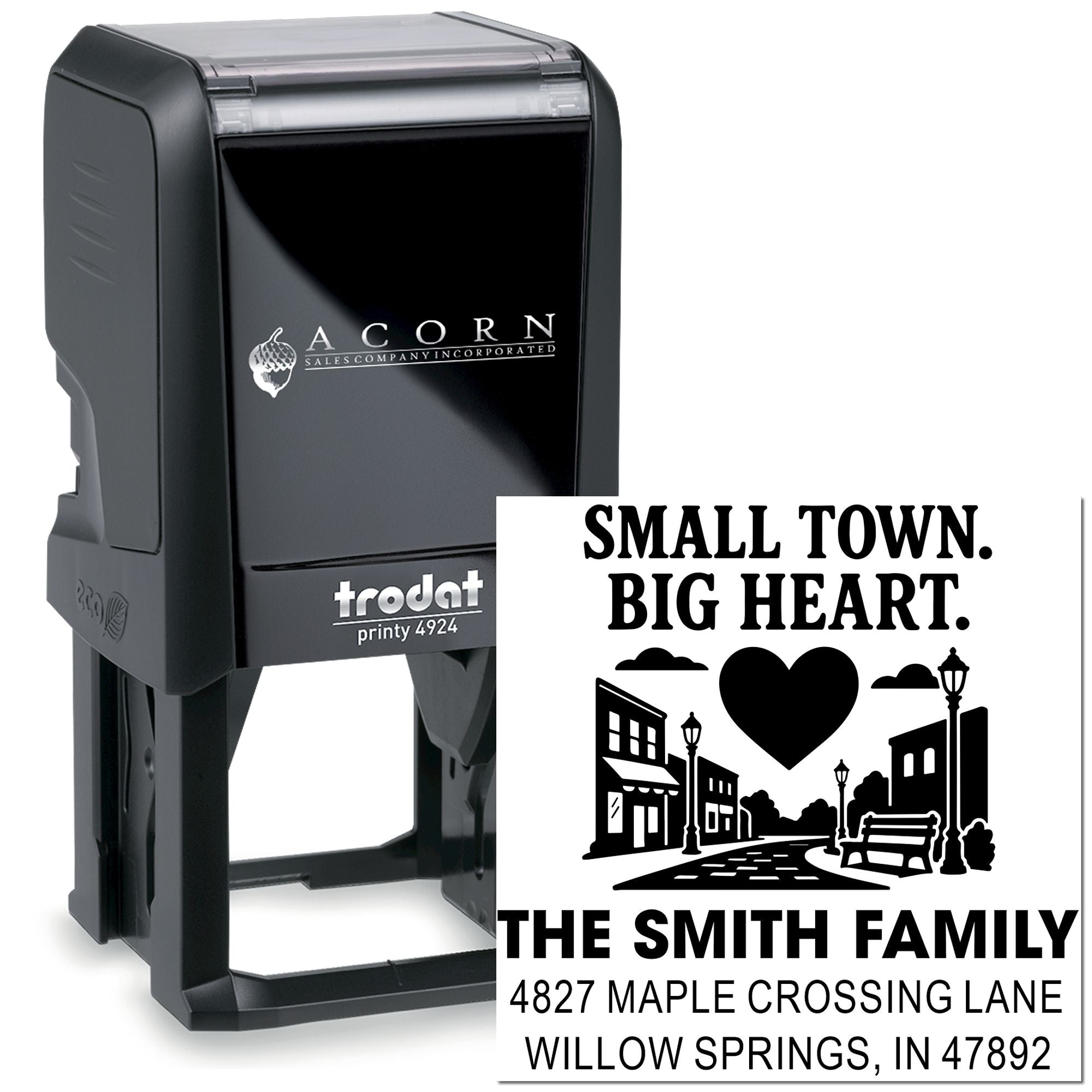Custom self-inking rubber address stamp with family name and Small Town, Big Heart design for personalized mailing.