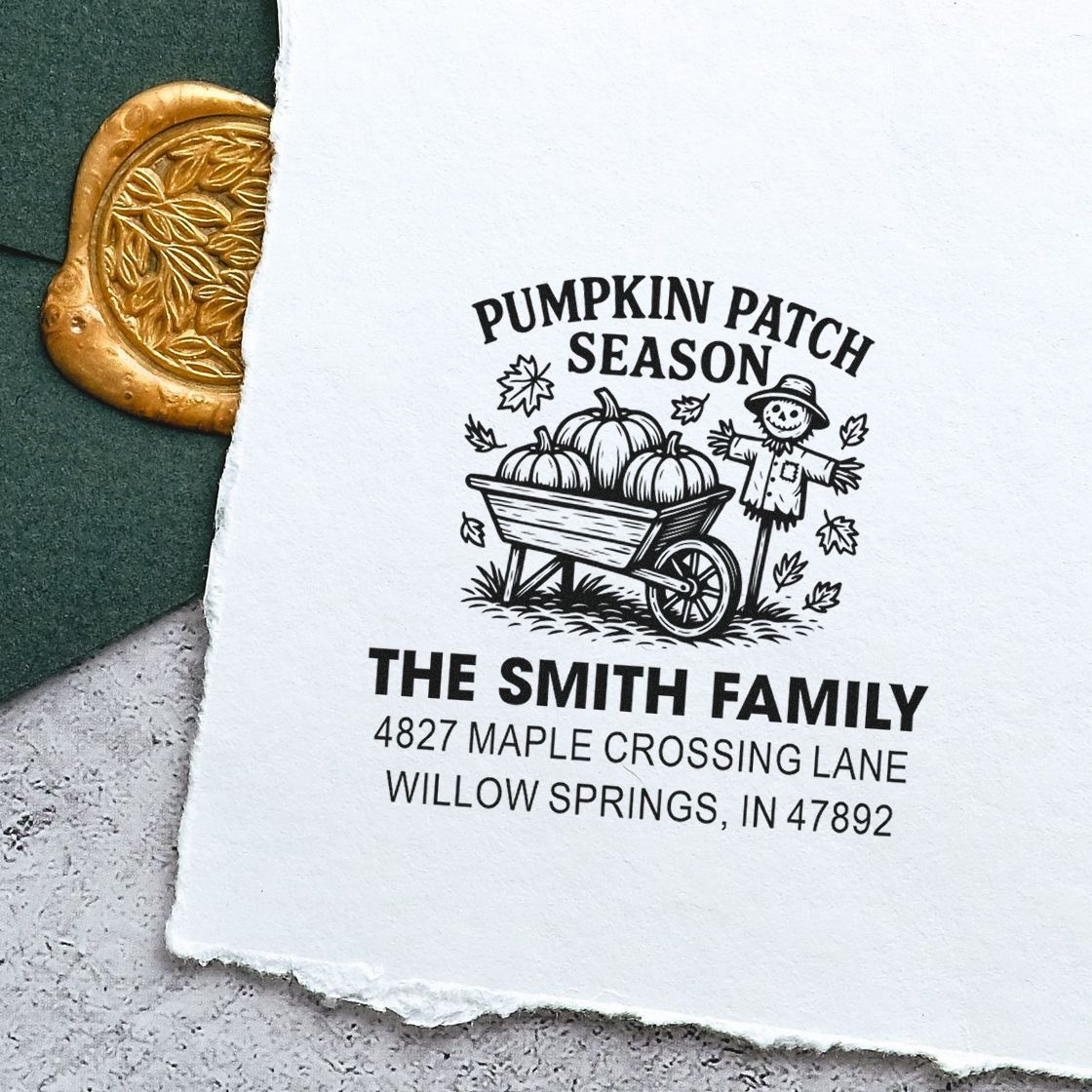 Custom fall return address rubber stamp with pumpkin patch design, scarecrow, and family name for seasonal mailings.