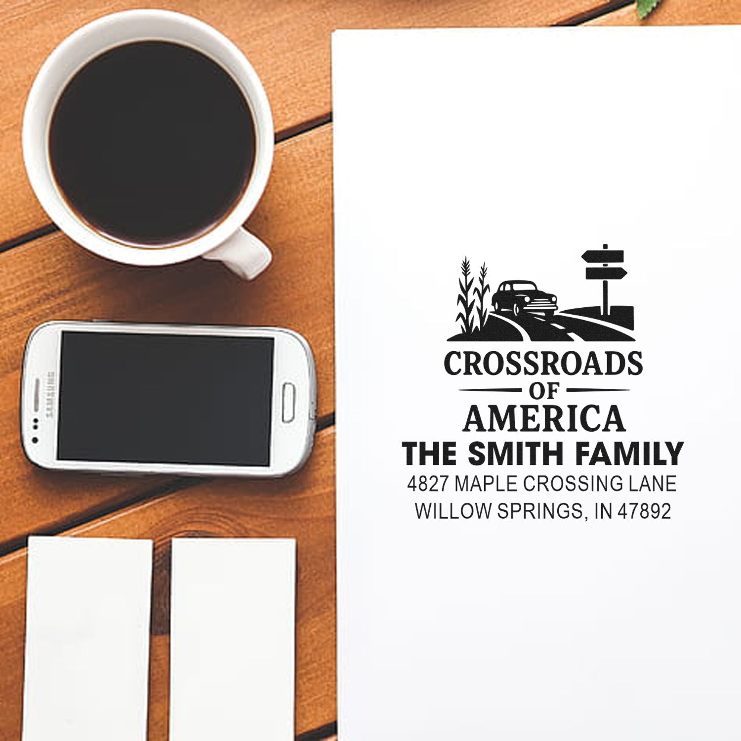 Custom self-inking address rubber stamp with crossroads design for The Smith Family mailings.