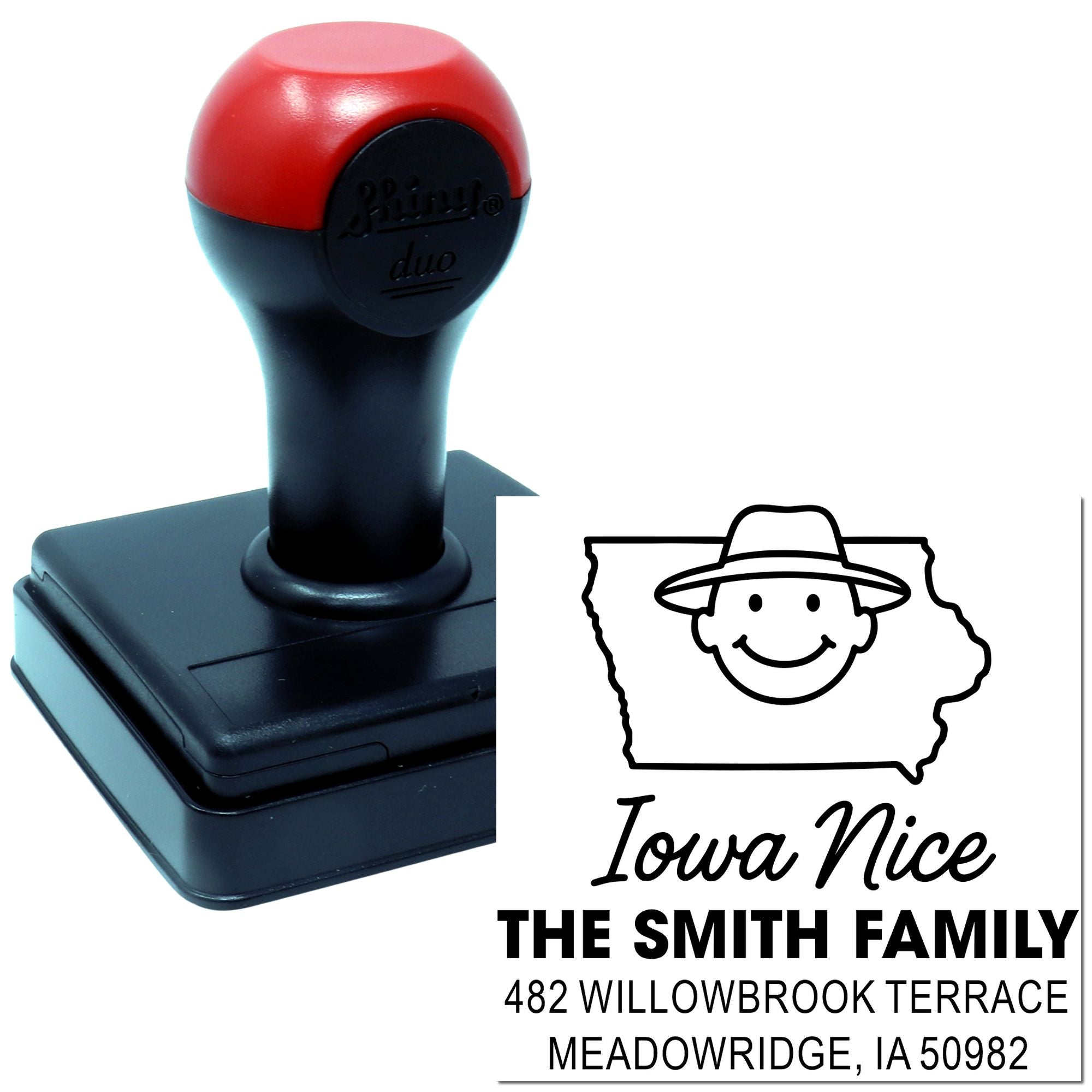 Custom self-inking rubber address stamp with Iowa outline logo, personalized family name, and return address for mailing.