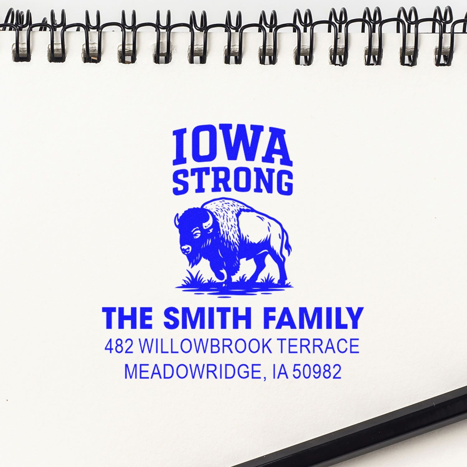 Custom address rubber stamp with Iowa Strong bison design for The Smith Family, 482 Willowbrook Terrace, Meadowridge, IA 50982.