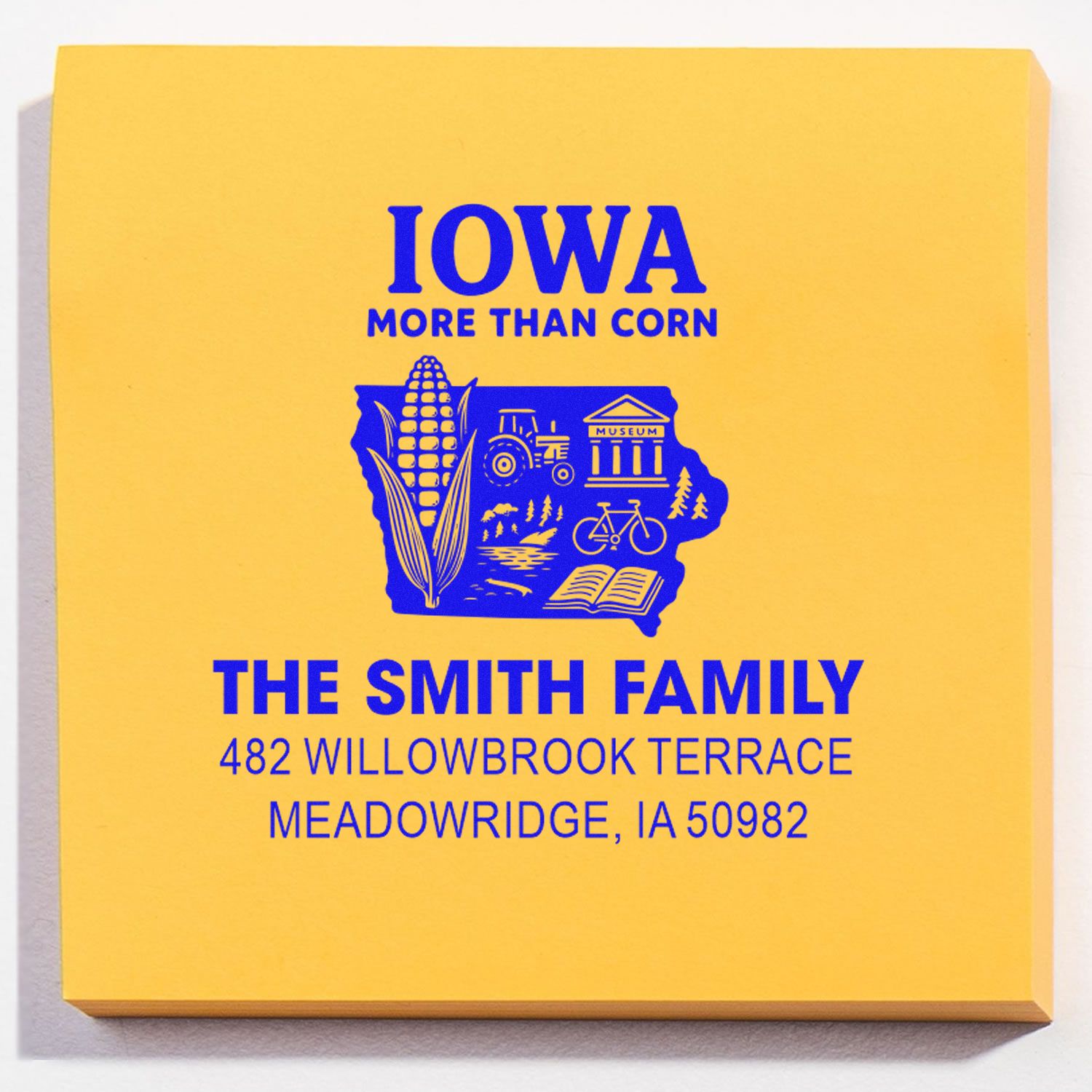 Custom return address rubber stamp for The Smith Family, featuring an Iowa outline and More Than Corn design.