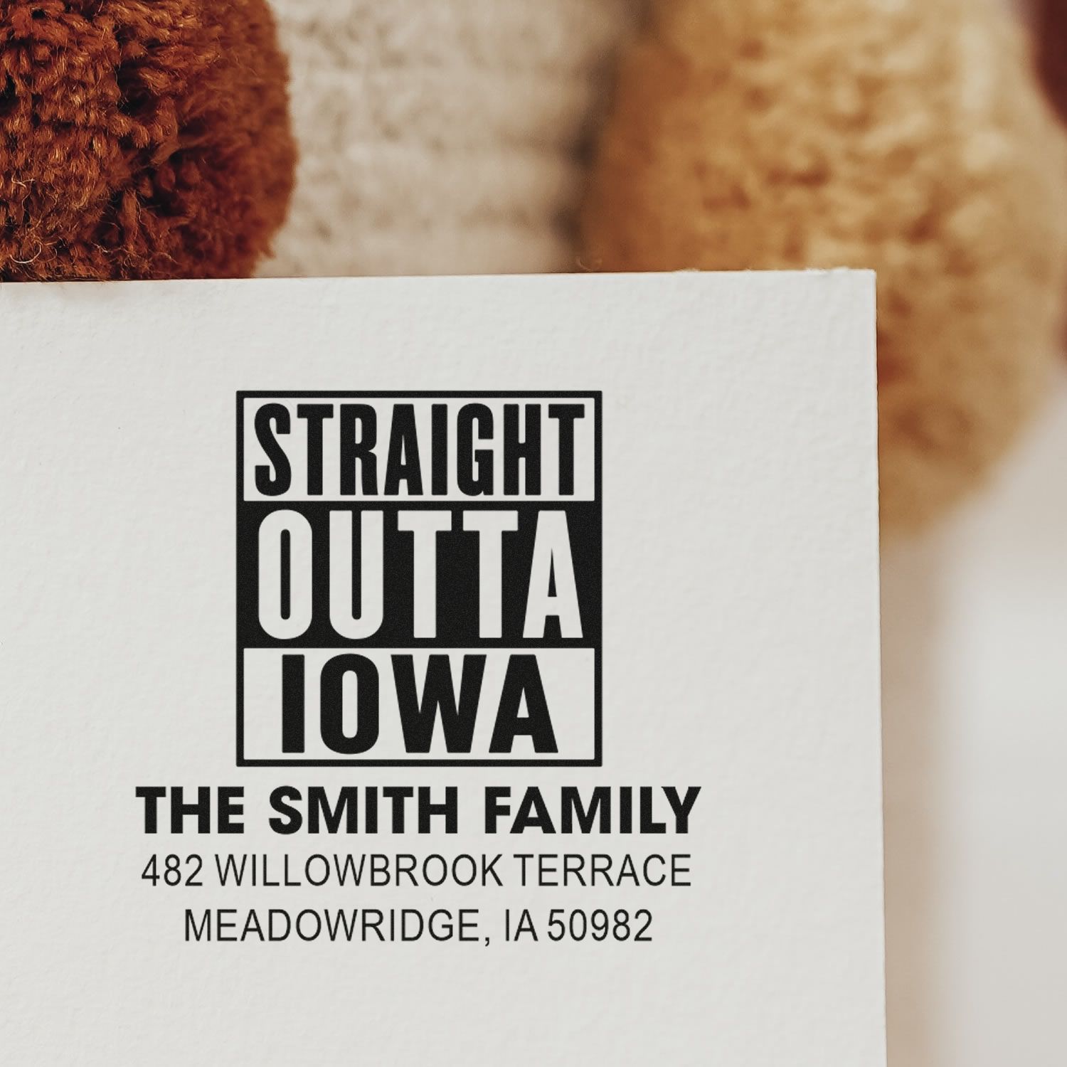 Custom rubber address stamp with Straight Outta Iowa design for The Smith Family return mail and personalized Iowa address.