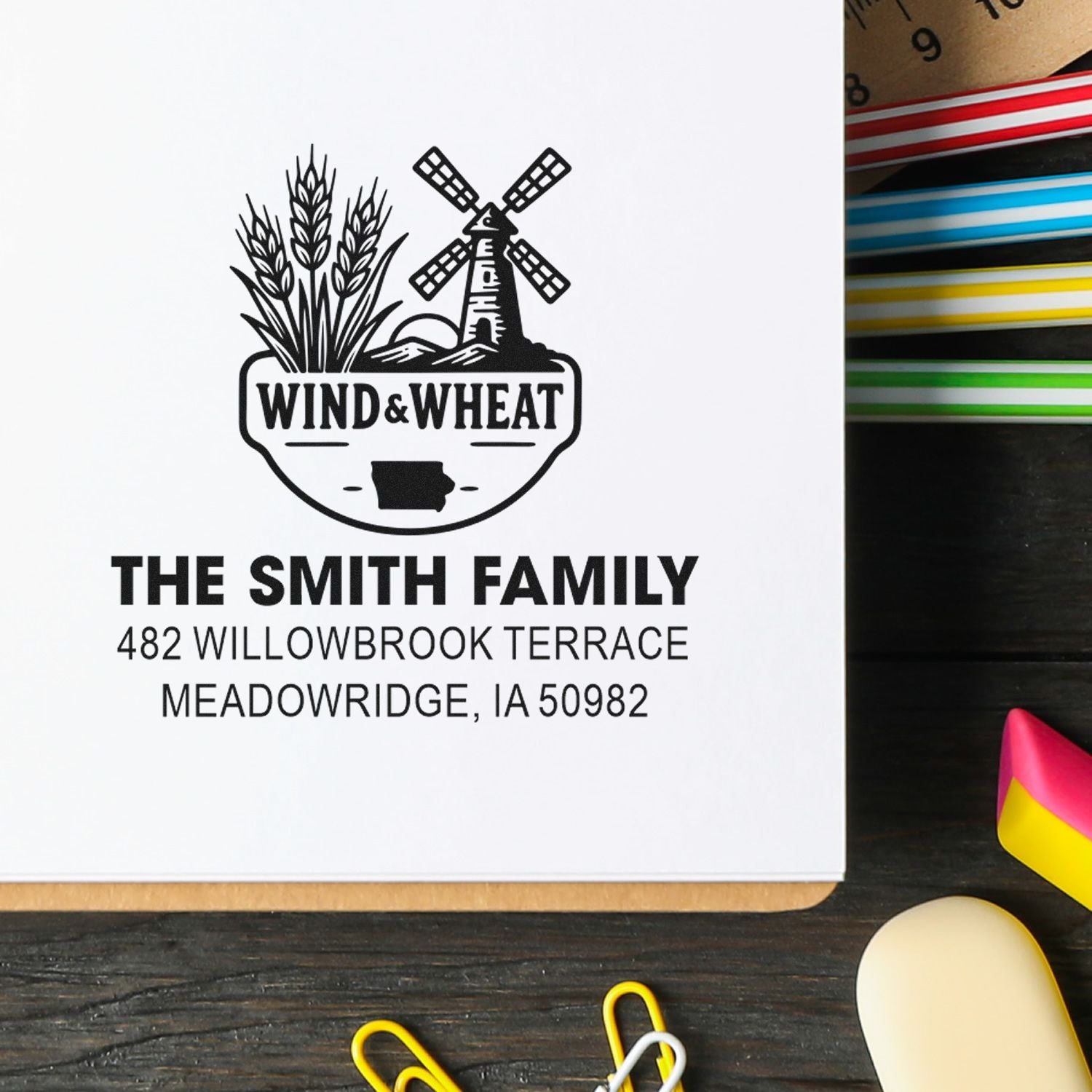 Custom rubber stamp with Wind & Wheat farm logo and Smith Family return address, perfect for personalized address stamping.