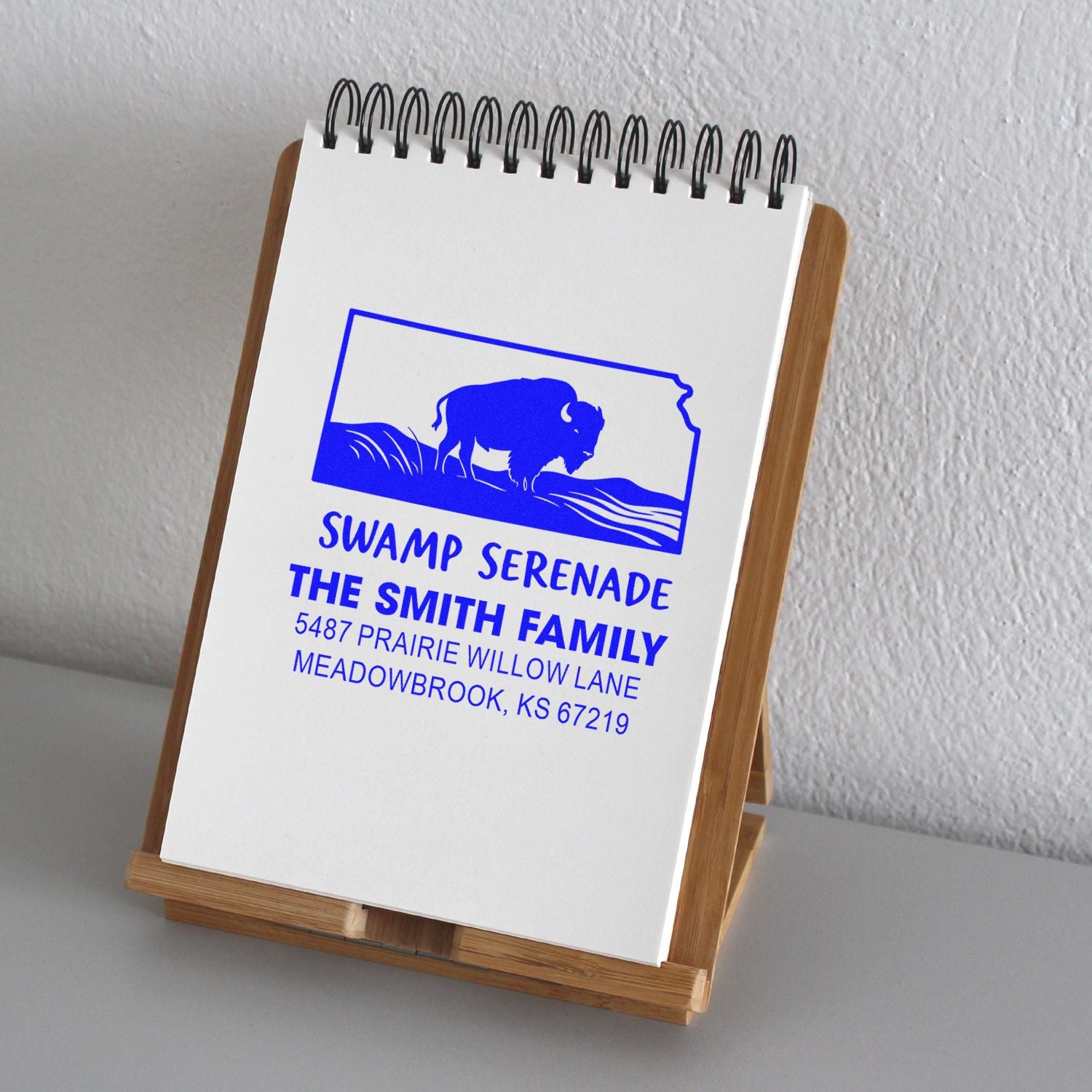 Custom return address rubber stamp with bison logo for The Smith Family, Meadowbrook, KS.
