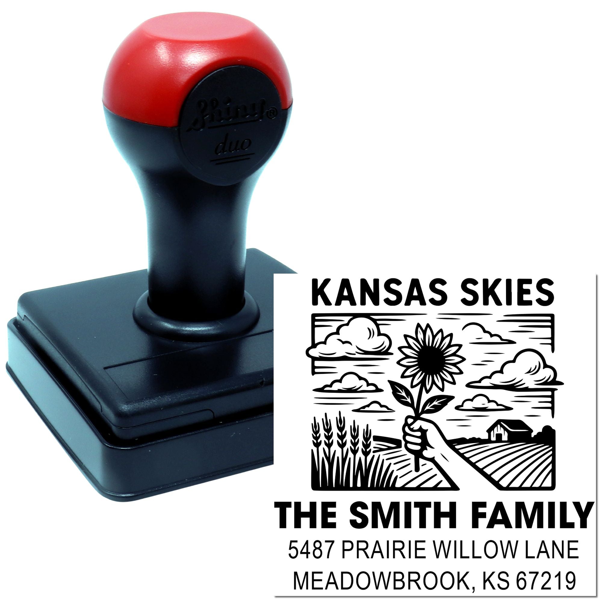 Custom self-inking rubber stamp with Kansas Skies family address design for personalized mailing and return address use.
