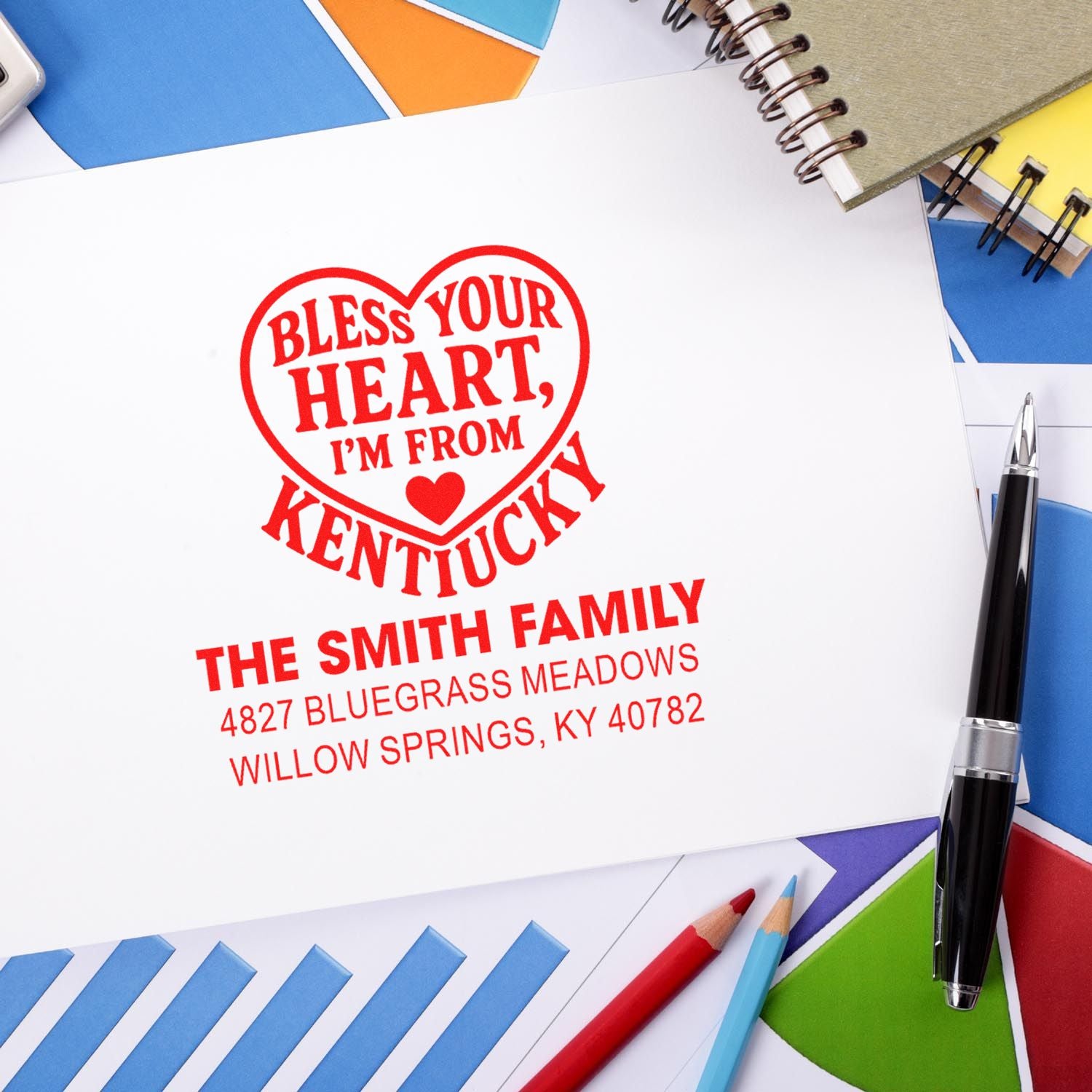 Personalized Kentucky return address rubber stamp with heart design and Smith family address on white paper