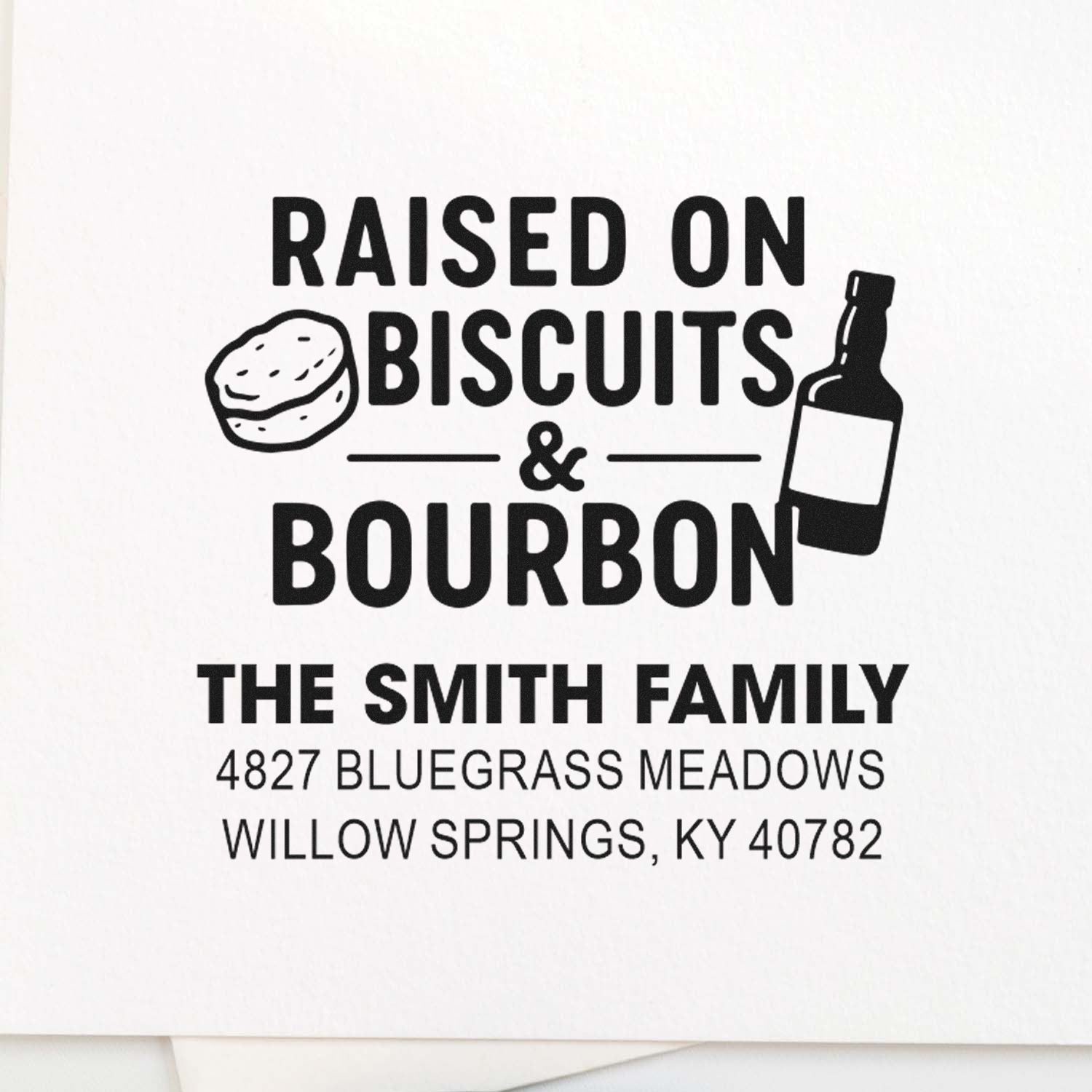 Custom rubber stamp design: Raised on Biscuits & Bourbon for The Smith Family, with biscuit and bourbon bottle icons.
