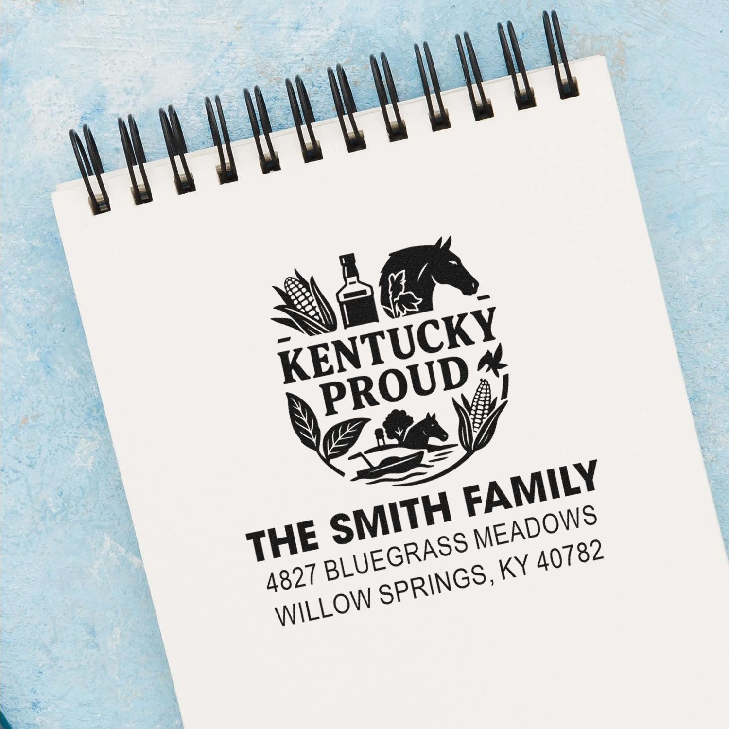 Custom Kentucky Proud rubber address stamp for The Smith Family in Willow Springs, KY with farm icons and address.
