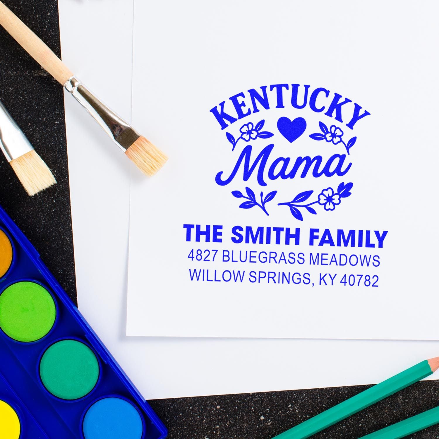 Personalized Kentucky Mama return address rubber stamp with family name and address for mailing.