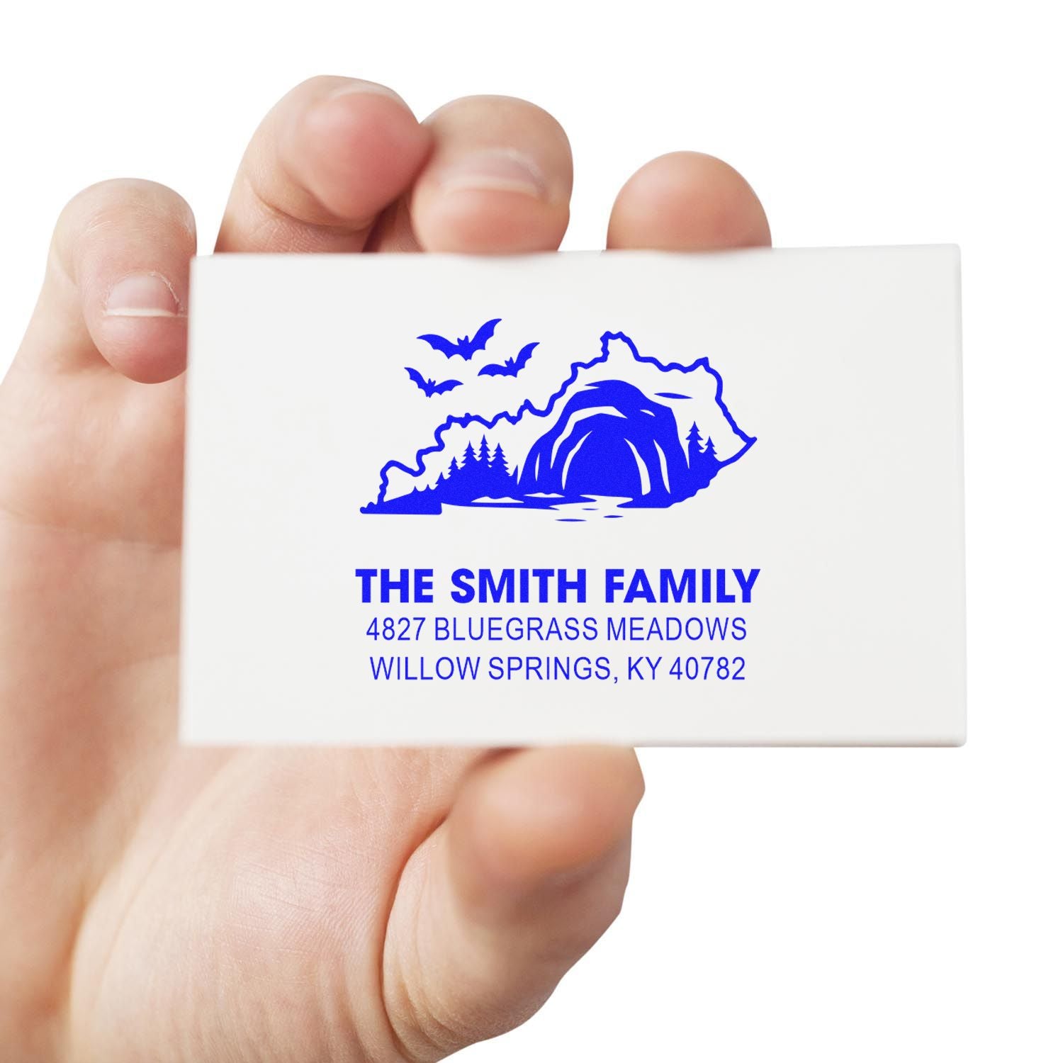 Custom return address rubber stamp with mountain logo for The Smith Family, featuring name and Willow Springs, KY address.