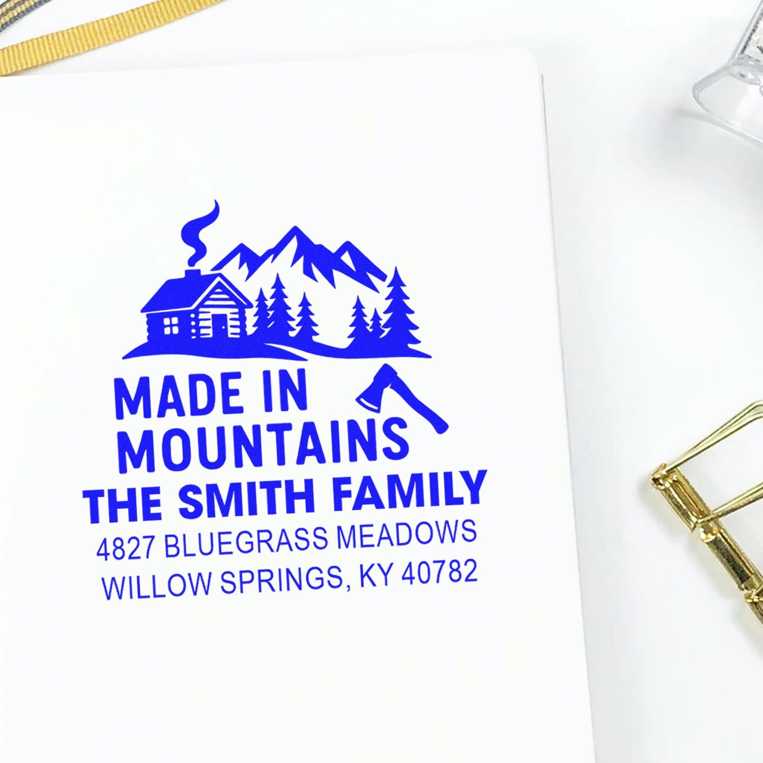 Custom family return address rubber stamp with mountain cabin design, axe icon, and personalized Willow Springs, KY address.