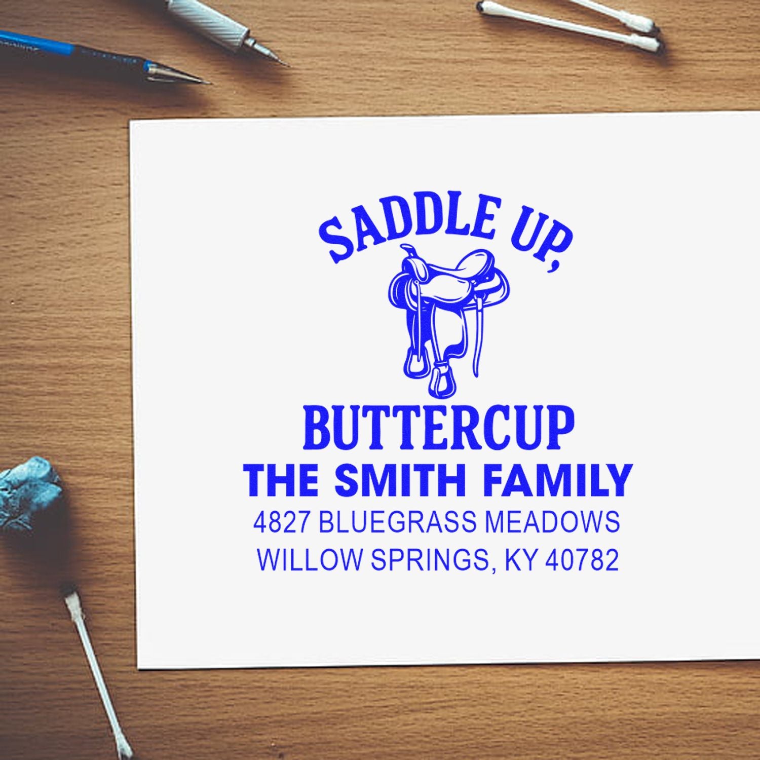 Personalized western return address rubber stamp for The Smith Family with saddle design and address.