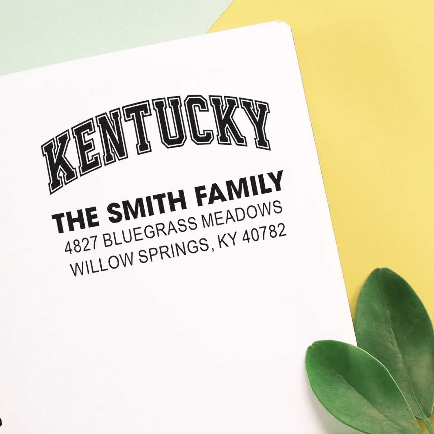 Custom Kentucky family address rubber stamp on stationery, featuring The Smith Family and Willow Springs, KY.