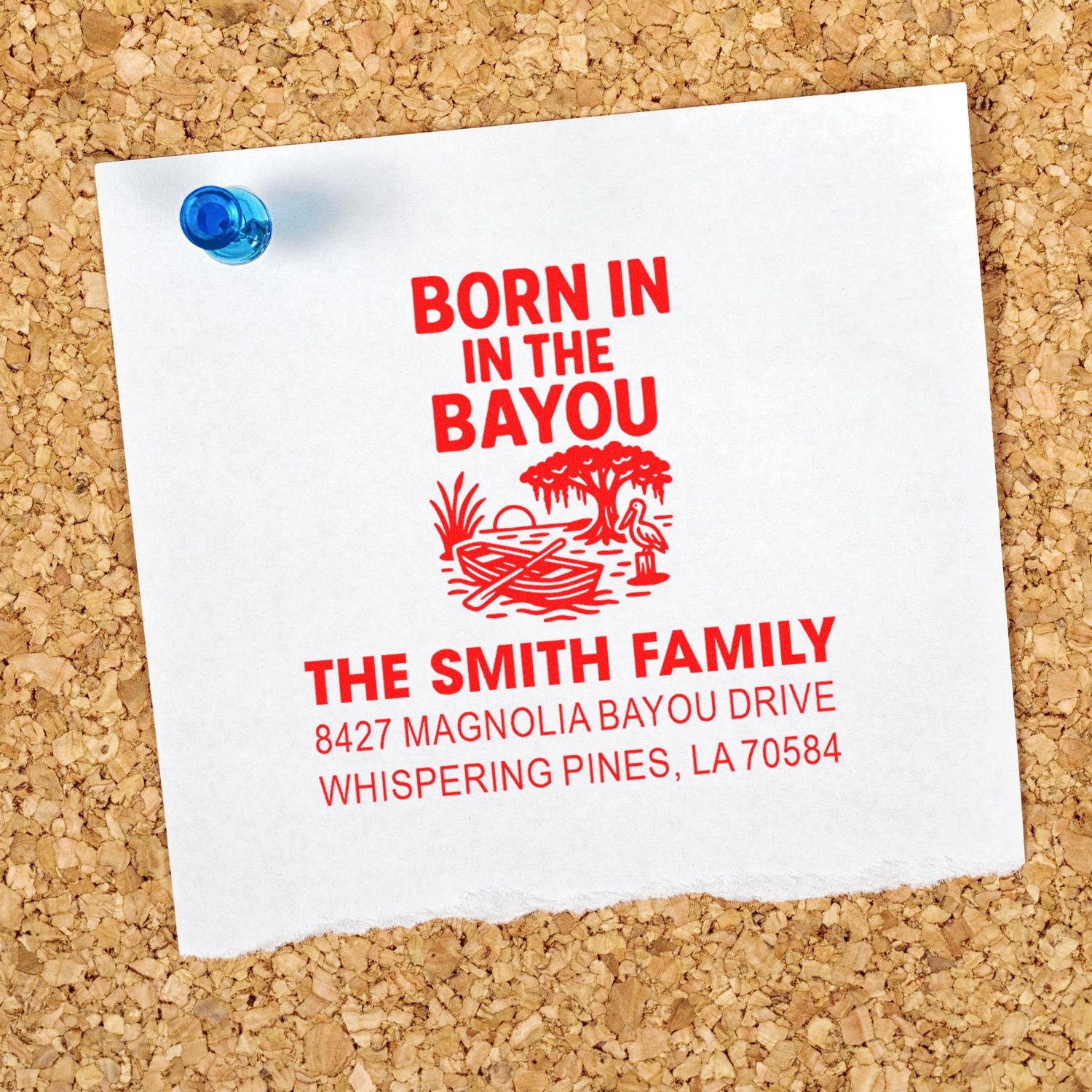 Custom return address rubber stamp with Born in the Bayou design, Smith family name, and Louisiana address on paper.