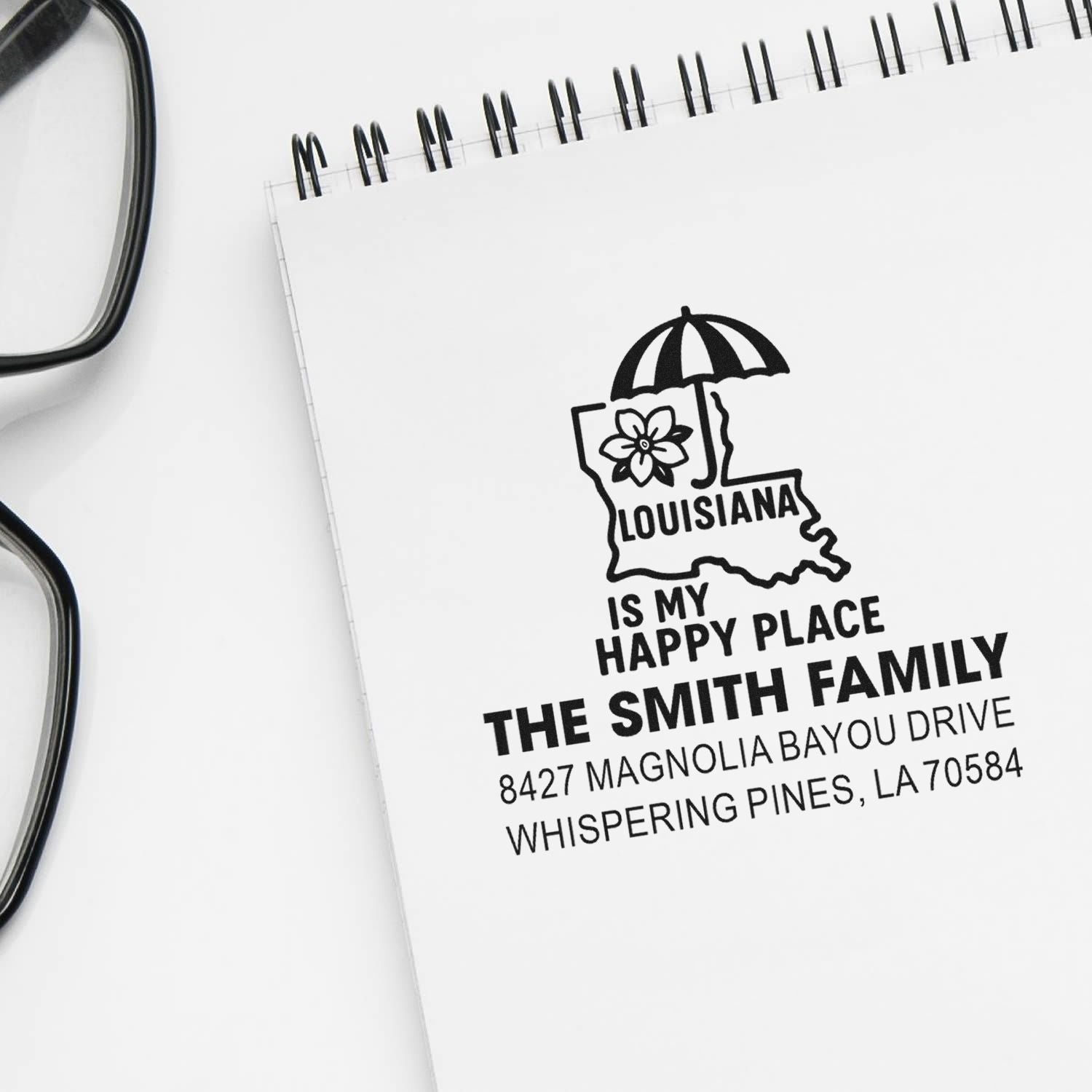 Personalized Louisiana rubber stamp with family name and address for custom home mail and stationery.