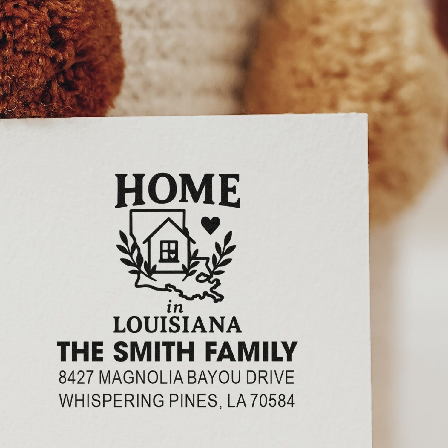 Personalized Louisiana home address rubber stamp for The Smith Family with house icon and return mailing address.