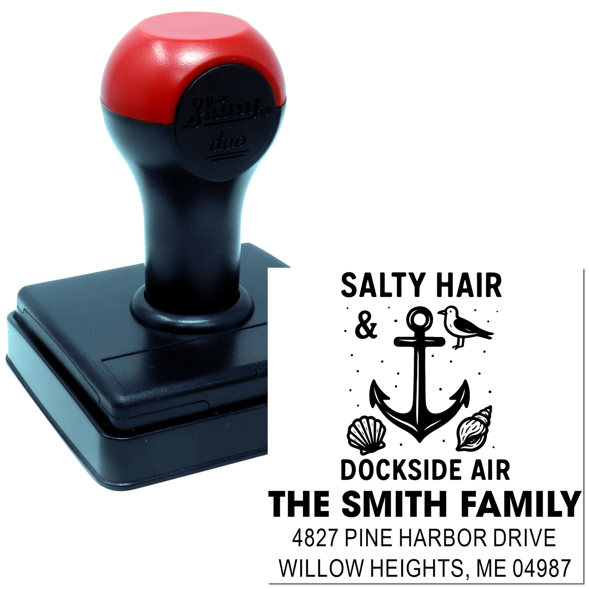 Personalized self-inking rubber stamp with nautical family address, anchor, and seashell design.