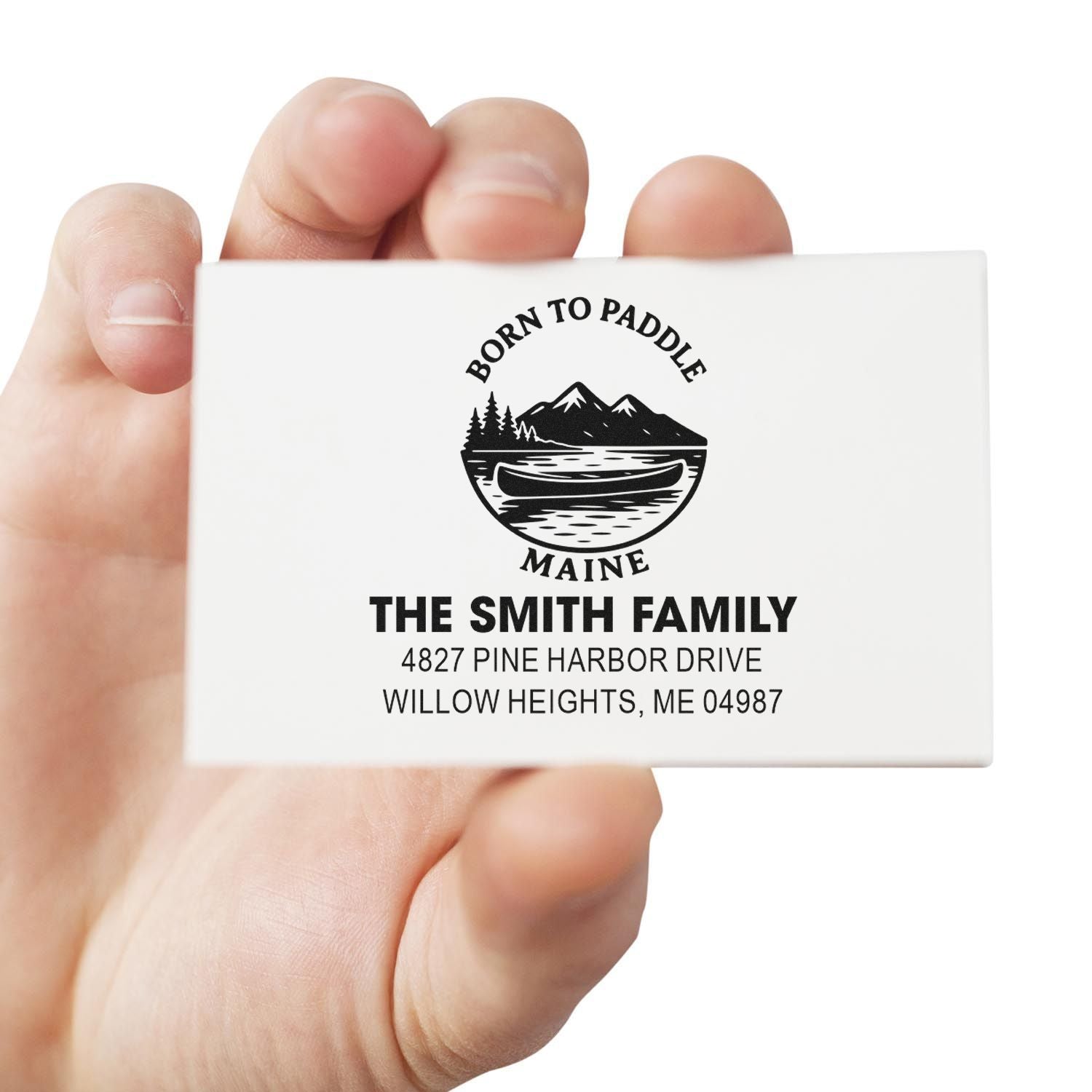 Personalized rubber address stamp with Born to Paddle Maine canoe logo and The Smith Family return address.