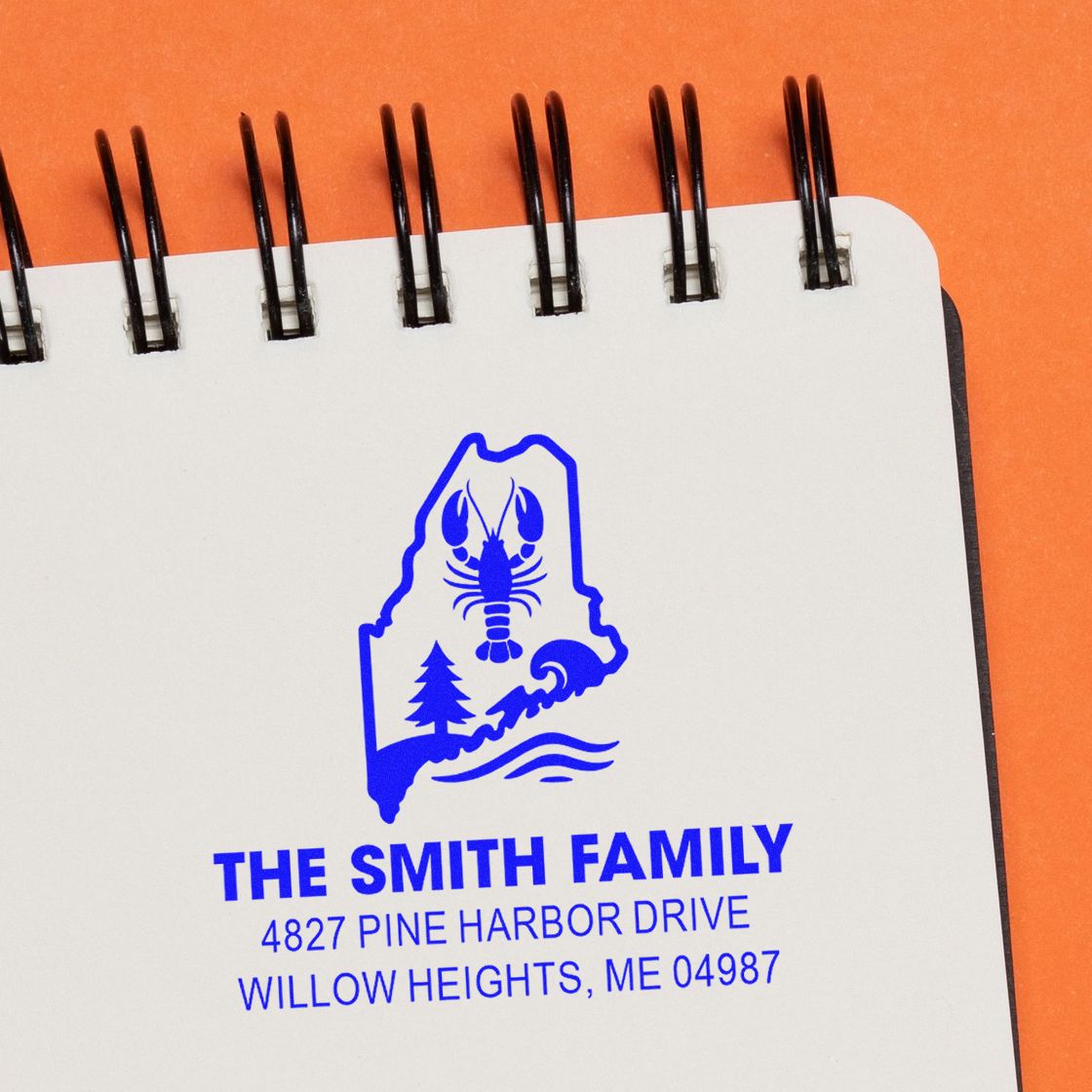 Custom Maine family address rubber stamp with lobster design for The Smith Family, Pine Harbor Drive, Willow Heights, ME 04987.