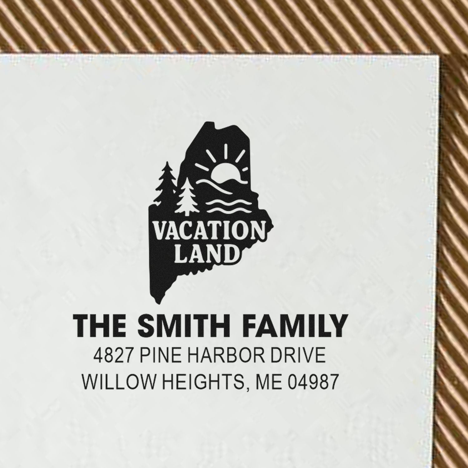 Custom return address rubber stamp for The Smith Family with Maine Vacation Land design and Willow Heights, ME address.