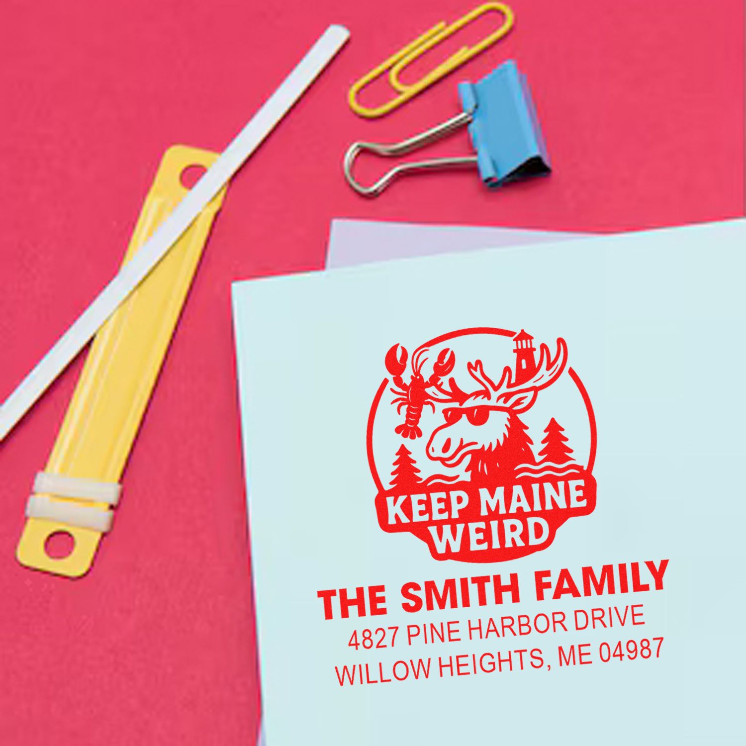 Custom rubber stamp with Maine moose design for personalized family return address envelopes.