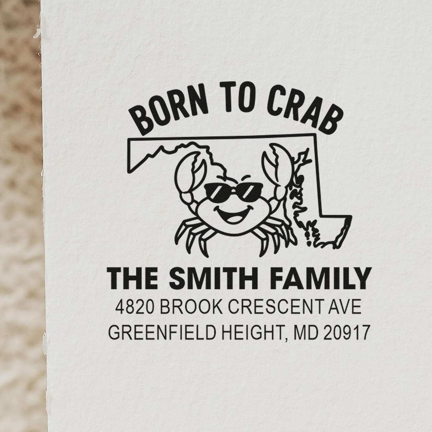 Custom rubber return address stamp with Maryland crab design, Born to Crab slogan, and Smith family mailing address.